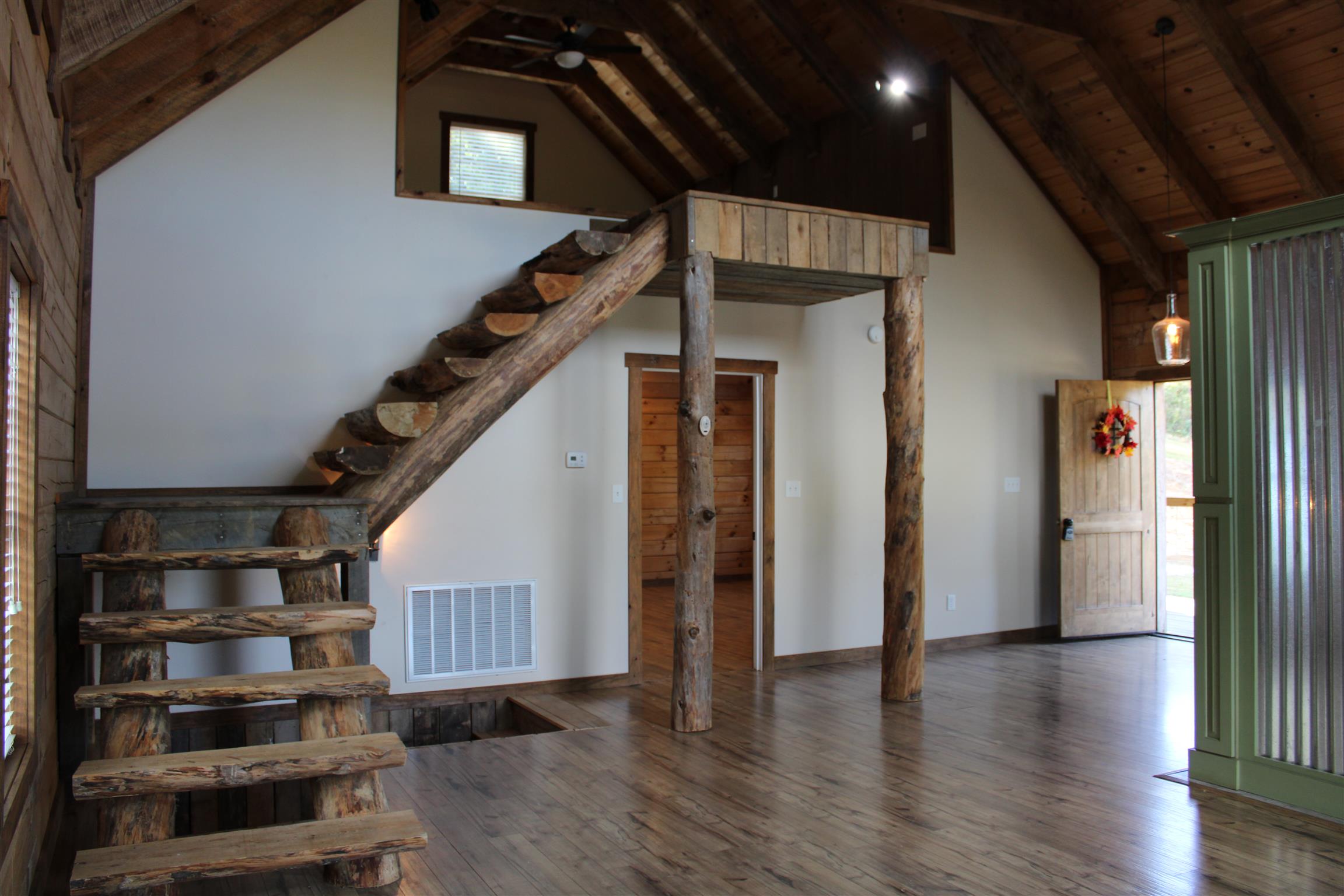 1501 Rolin Hollow Road Ardmore, TN 38449 - Photo 6 of 30 a view of entryway with wooden floor