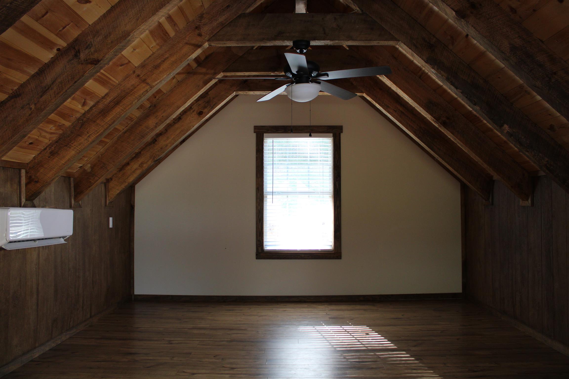 1501 Rolin Hollow Road Ardmore, TN 38449 - Photo 8 of 30 a view of a livingroom with wooden floor and door