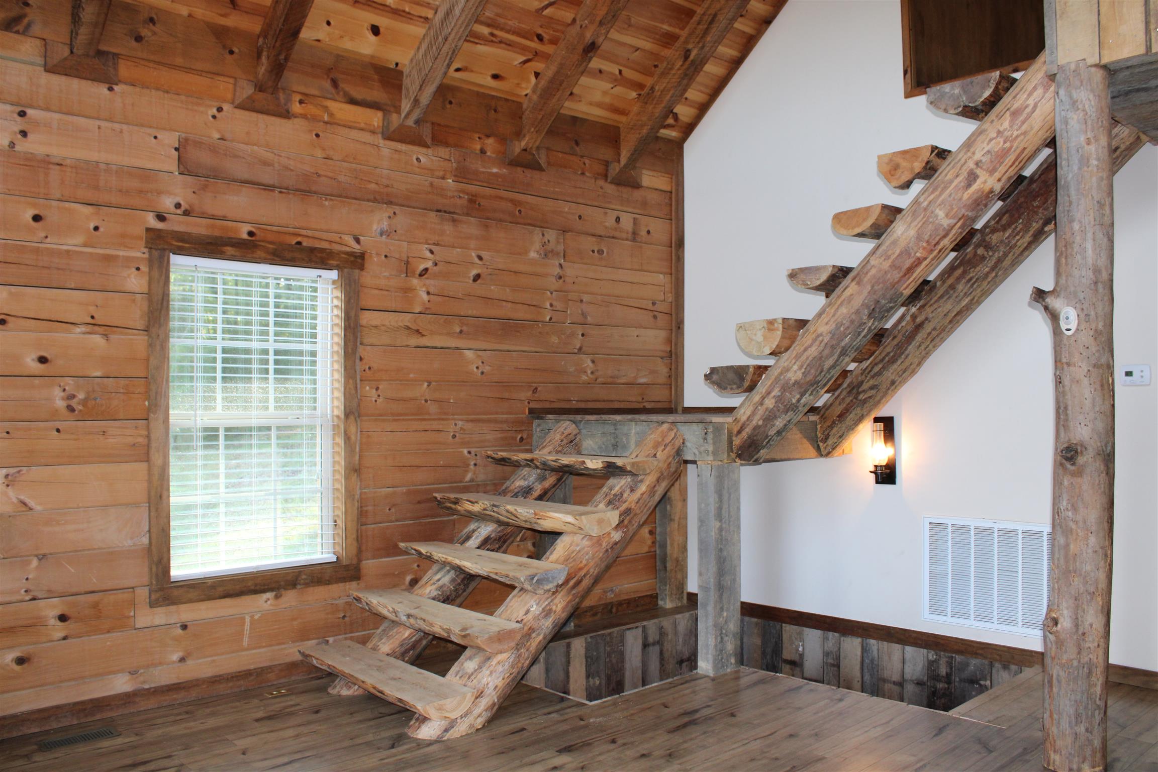 1501 Rolin Hollow Road Ardmore, TN 38449 - Photo 9 of 30 a view of entryway with wooden floor