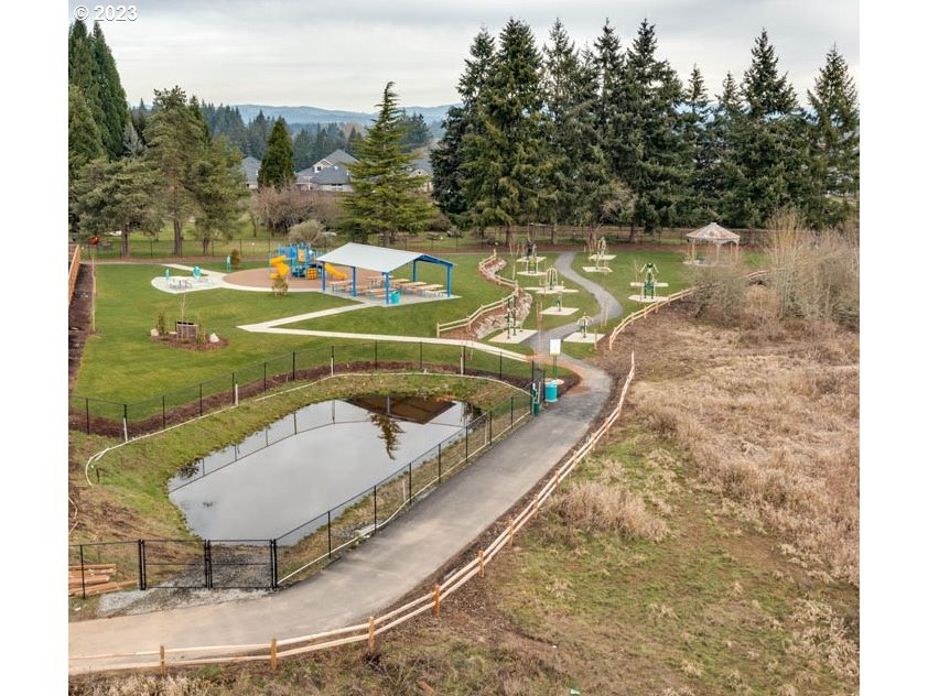 2903 North 3rd Way Ridgefield, WA 98642 - Photo 30 of 38 a view of a swimming pool with a yard