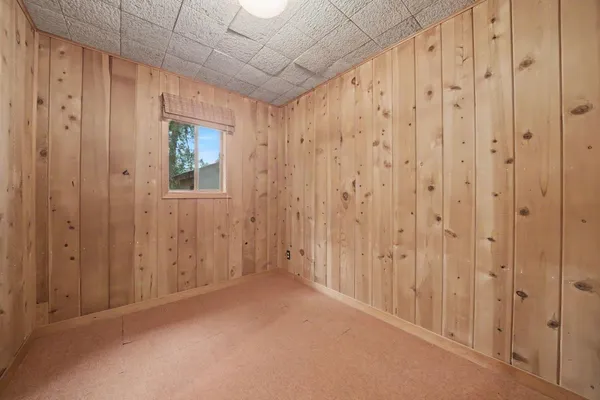 a bathroom with a shower and a tub