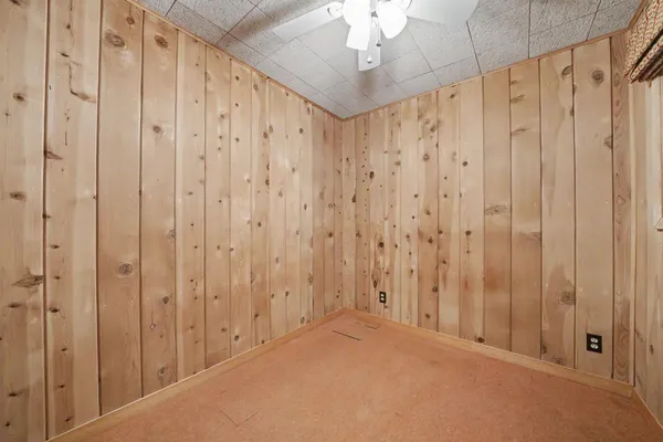 a view of a two chairs and table in the balcony