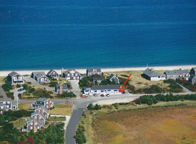 a view of a building with a yard