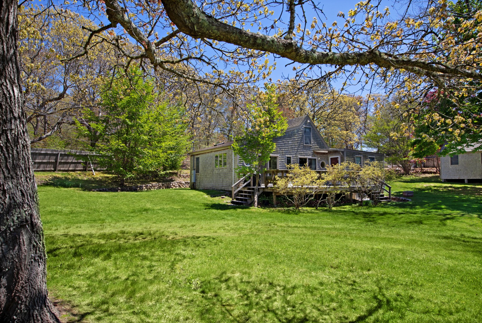 10 Abel's Neck Road Chilmark, MA 02535 - Photo 14 of 20 a view of a house with backyard and garden