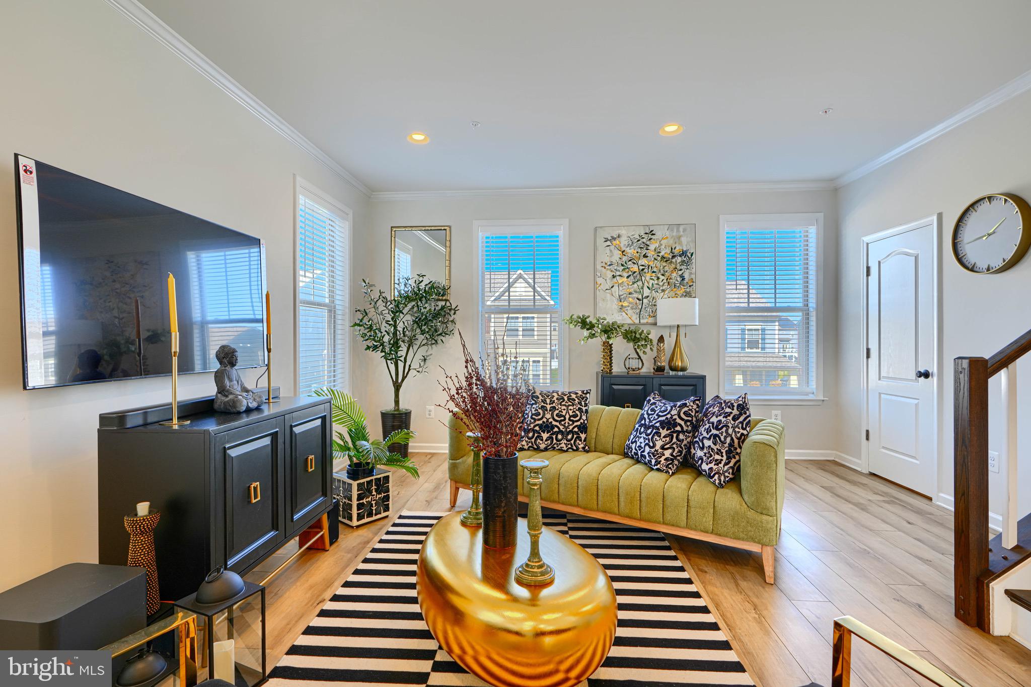 1324 Ricketts Road Frederick, MD 21702 - Photo 11 of 49 a living room with furniture and a rug