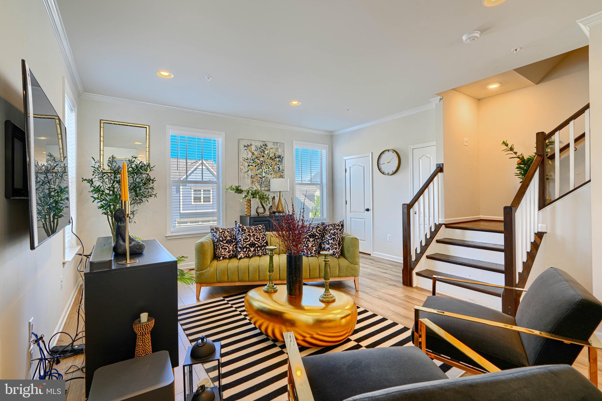 1324 Ricketts Road Frederick, MD 21702 - Photo 12 of 49 a living room with furniture kitchen view and a large window