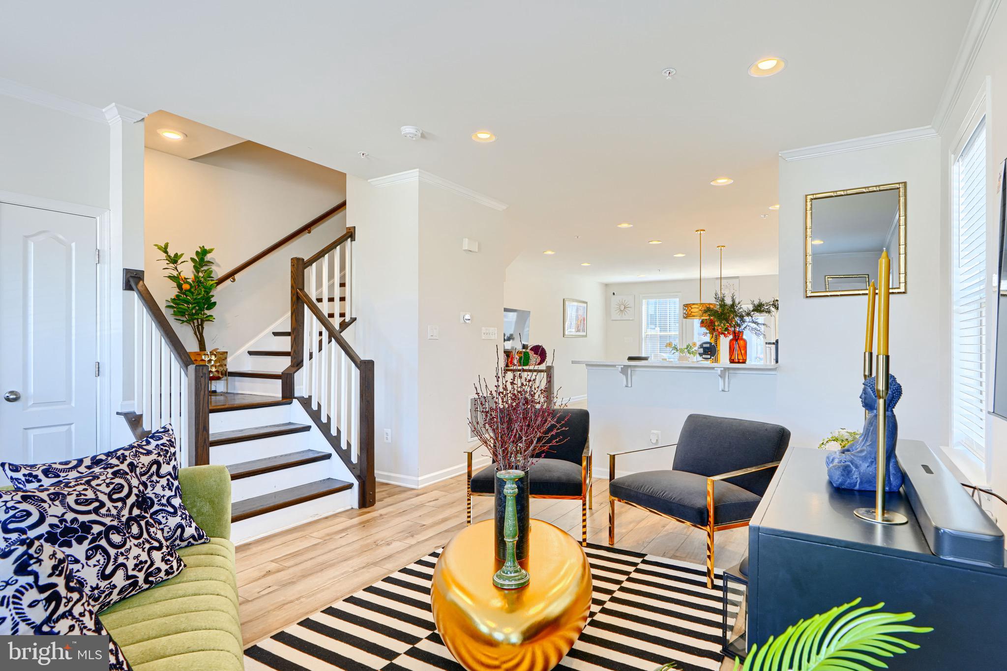 1324 Ricketts Road Frederick, MD 21702 - Photo 15 of 49 a living room with furniture and wooden floor
