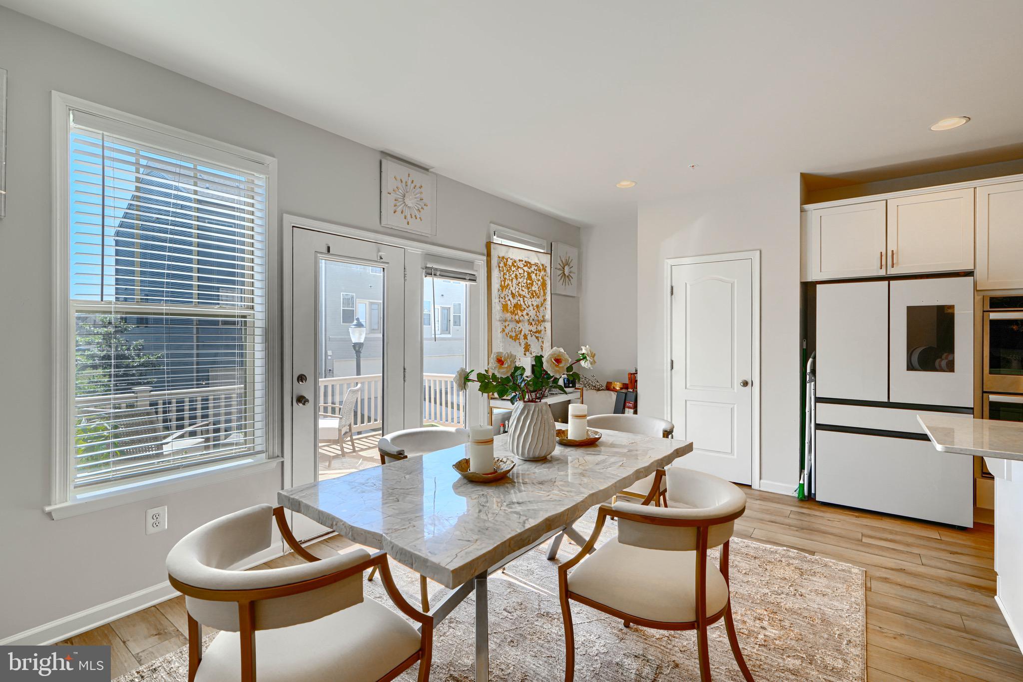 1324 Ricketts Road Frederick, MD 21702 - Photo 23 of 49 a view of a dining room with furniture window and wooden floor