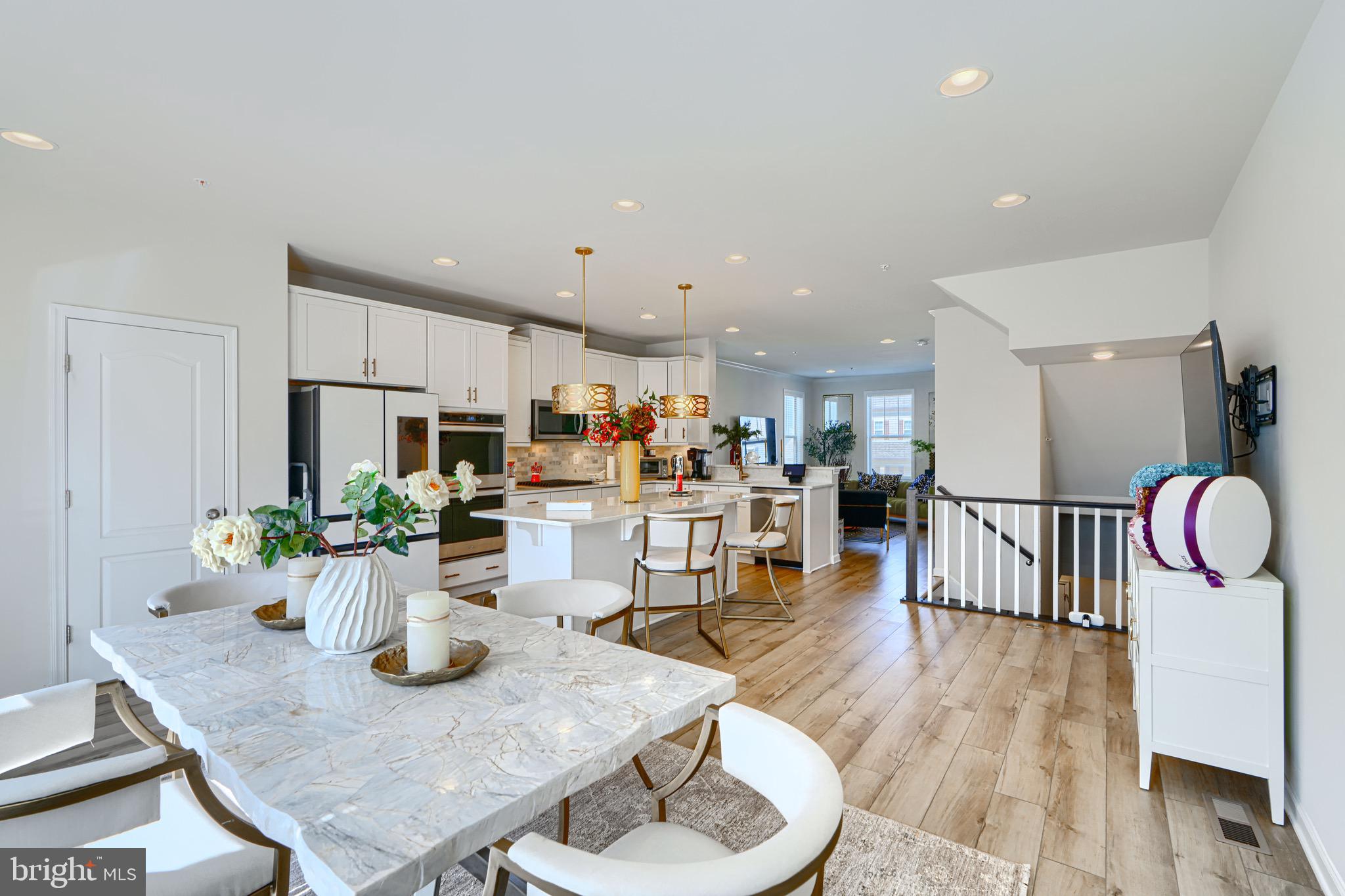 1324 Ricketts Road Frederick, MD 21702 - Photo 25 of 49 a view of a dining room with furniture and wooden floor
