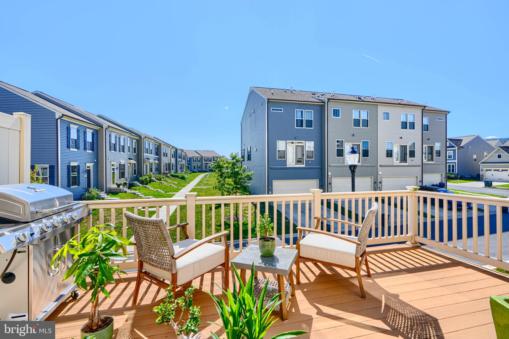 1324 Ricketts Road Frederick, MD 21702 - Photo 28 of 49 a view of a chairs and table in patio