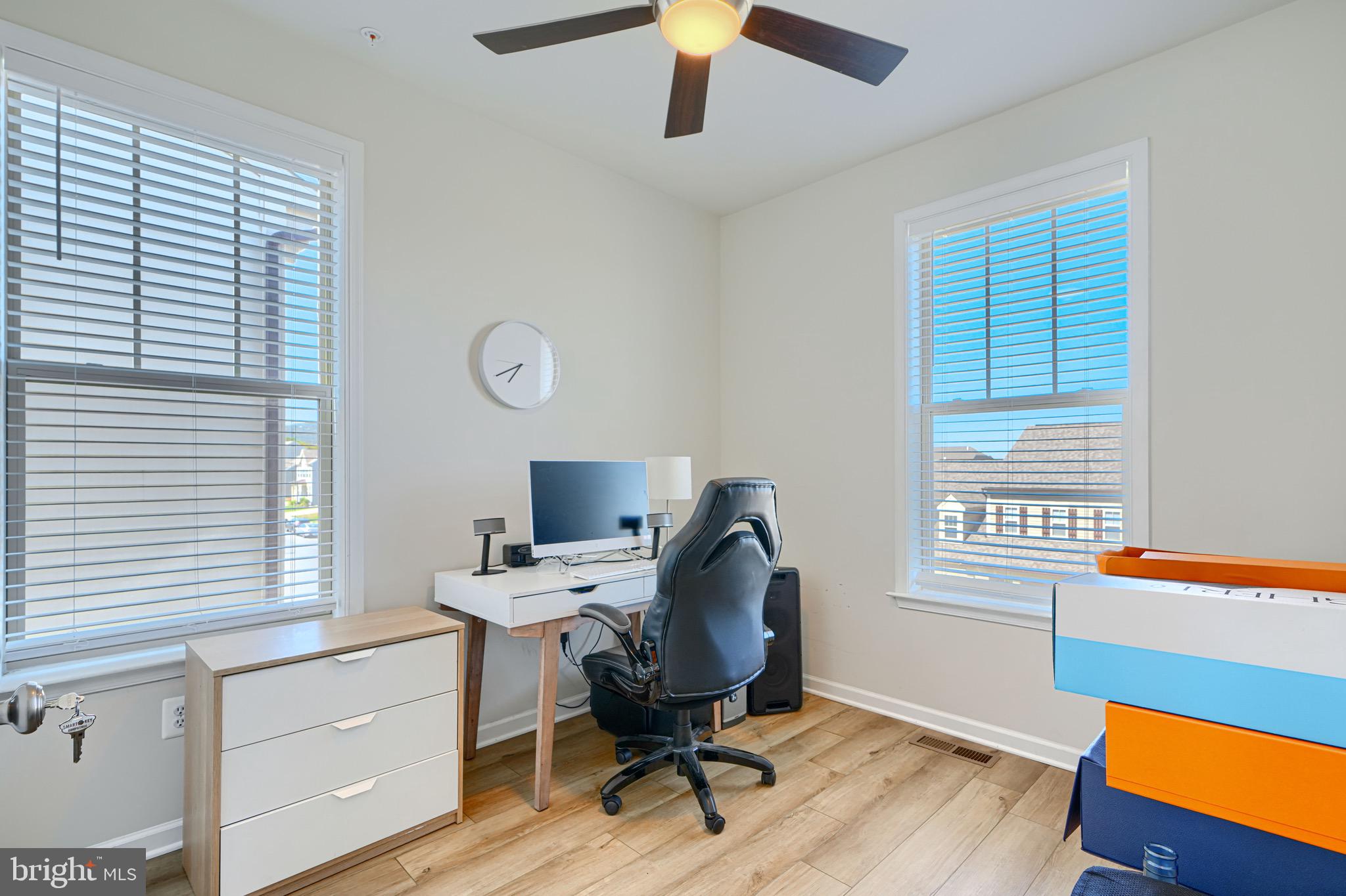 1324 Ricketts Road Frederick, MD 21702 - Photo 32 of 49 a view of a workspace with furniture and a window