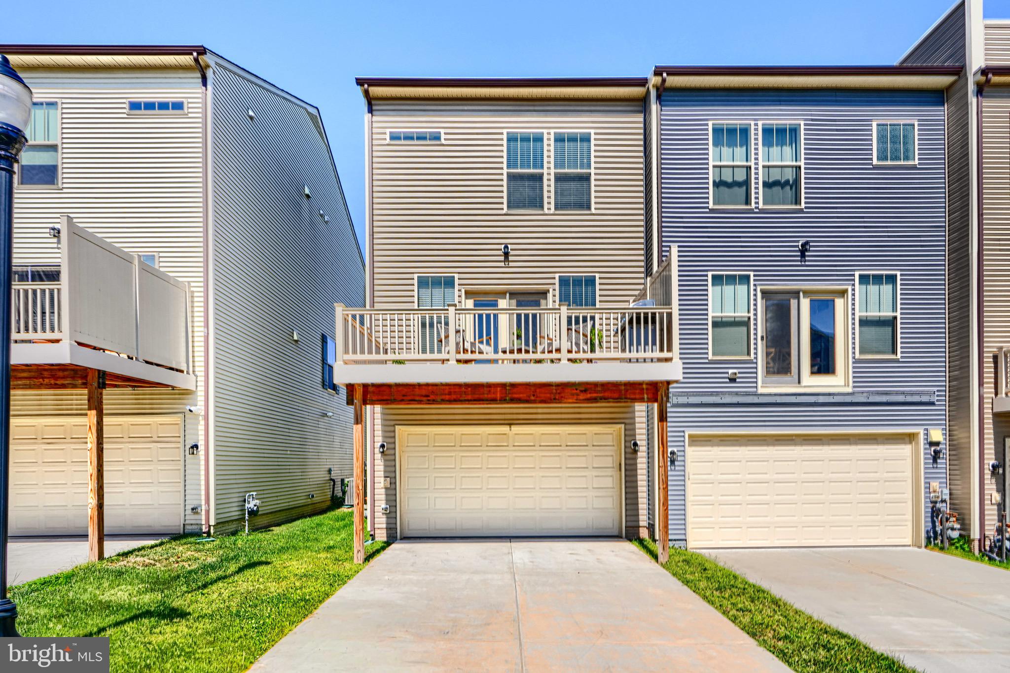 1324 Ricketts Road Frederick, MD 21702 - Photo 48 of 49 a front view of a house with a yard and garage