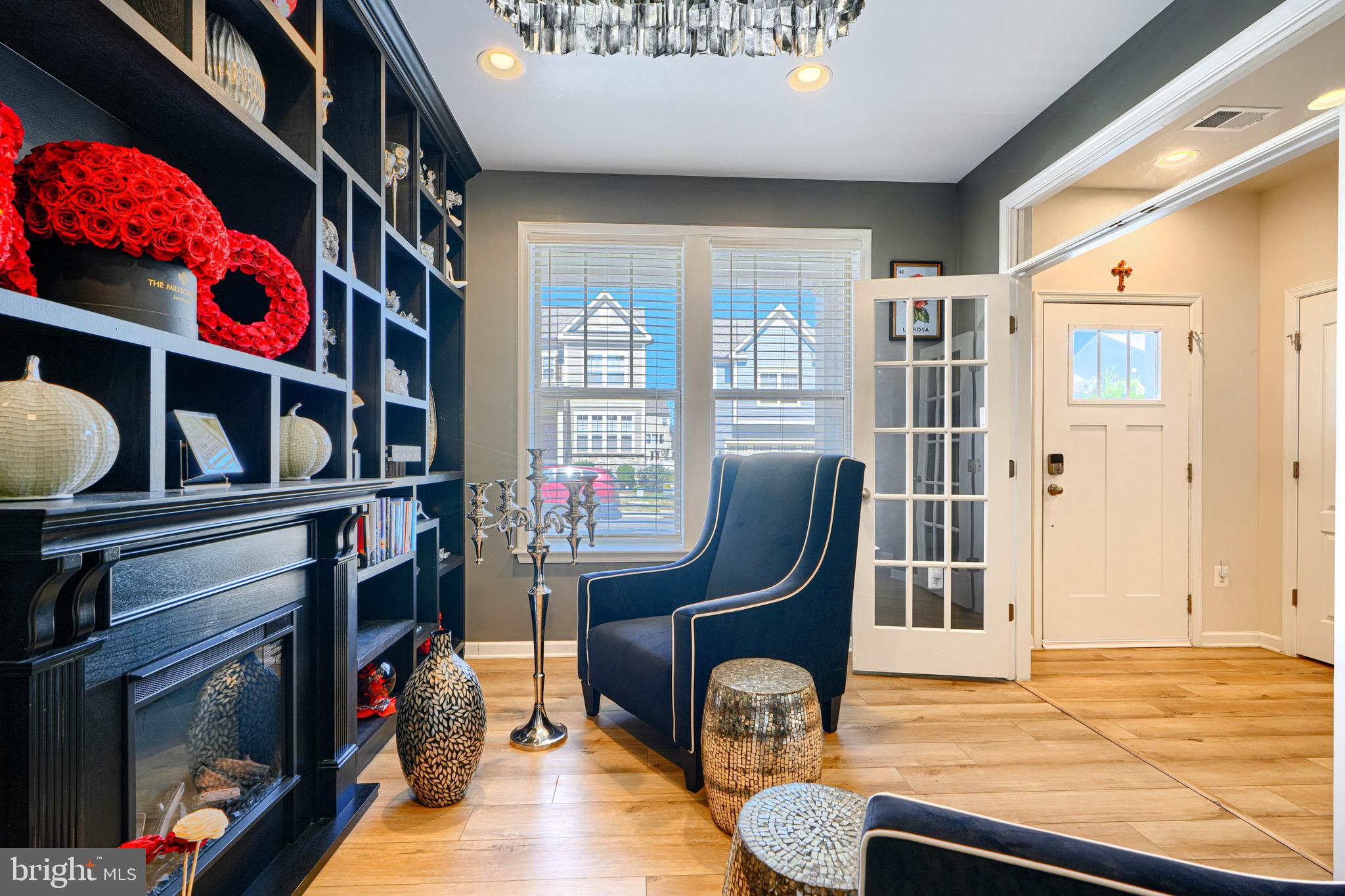 1324 Ricketts Road Frederick, MD 21702 - Photo 5 of 49 a view of a livingroom with furniture and a fireplace