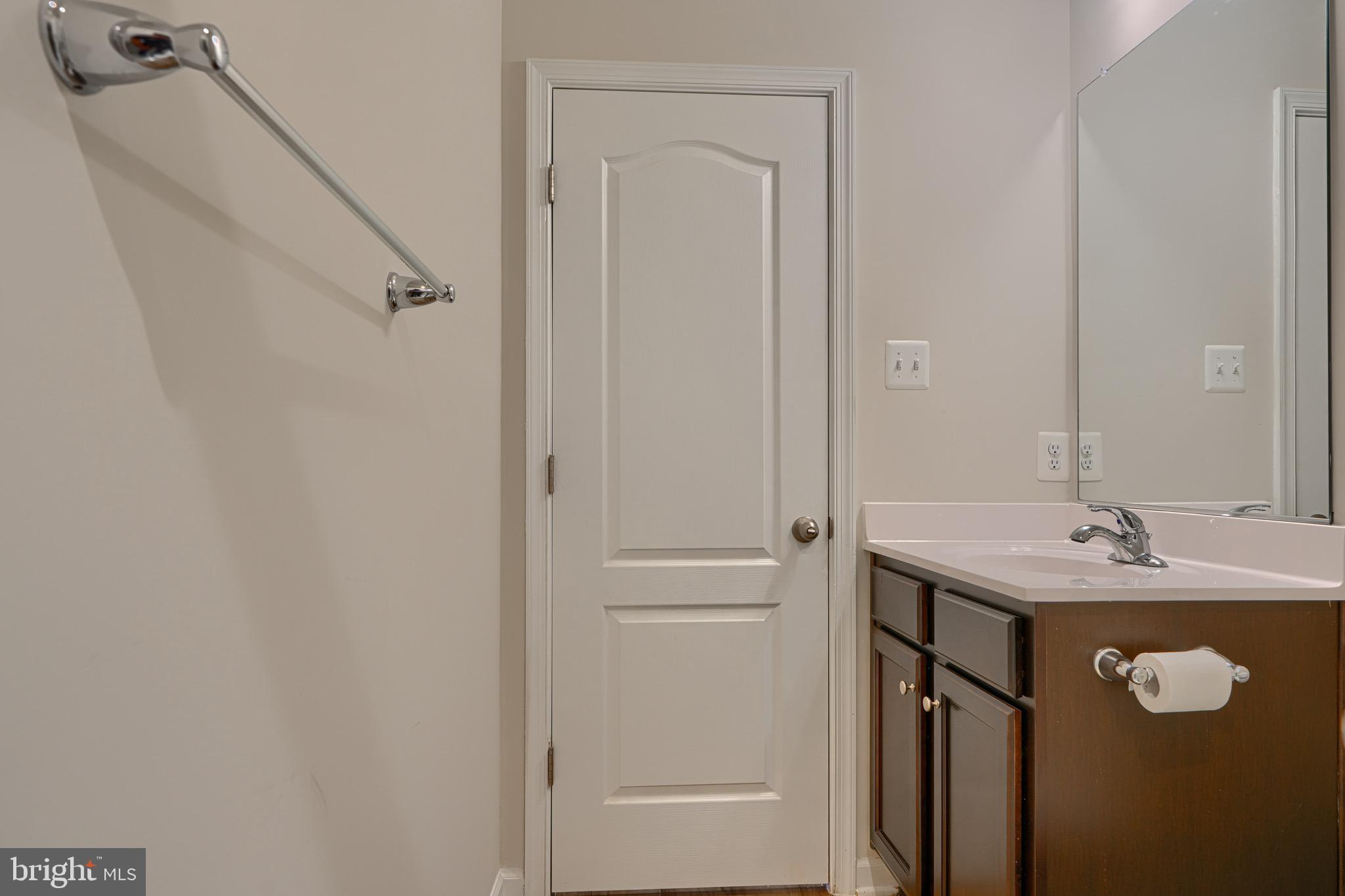 1324 Ricketts Road Frederick, MD 21702 - Photo 9 of 49 a bathroom with a sink and mirror