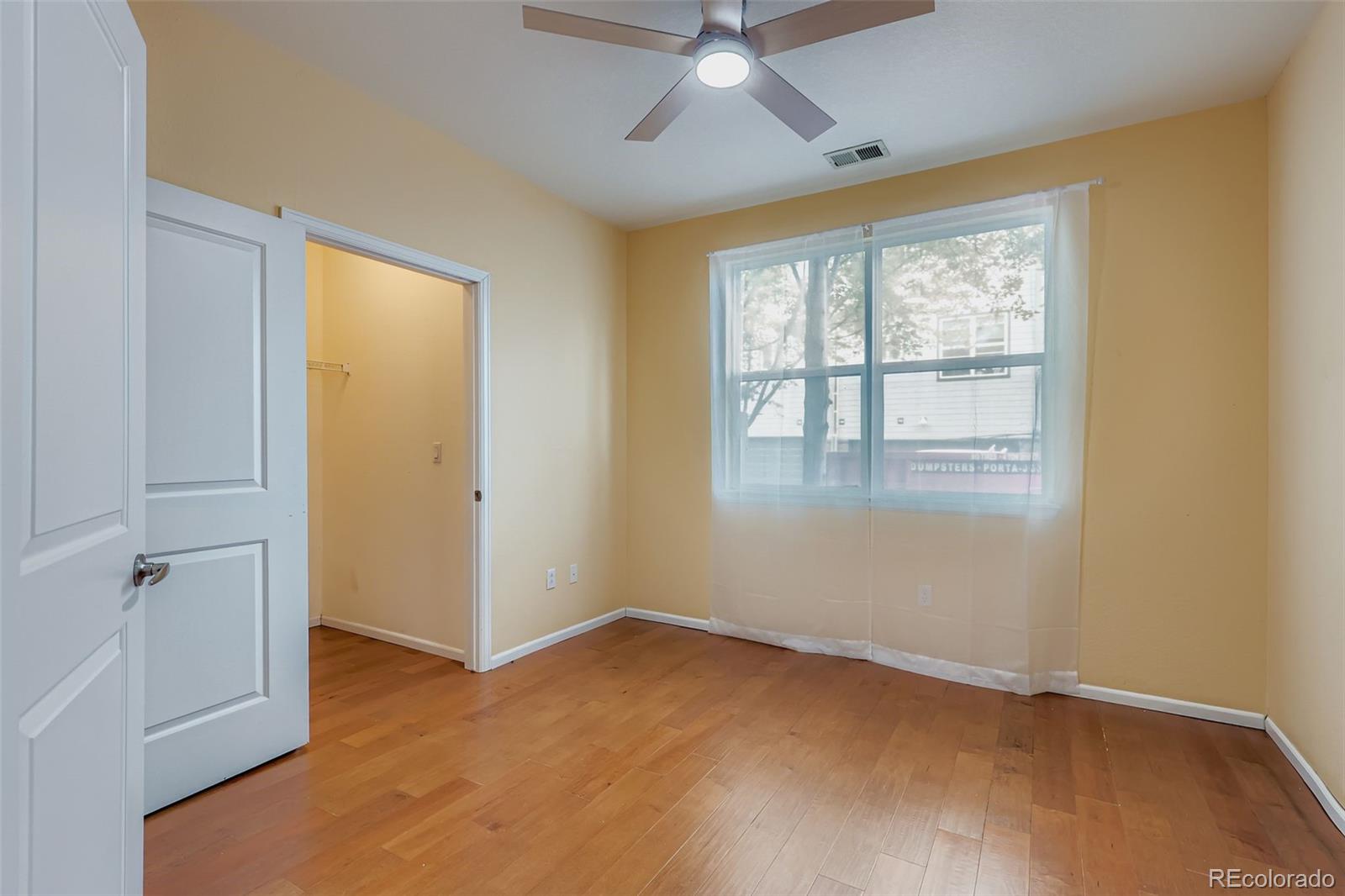 11316 Colony Circle Broomfield, CO 80021 - Photo 12 of 20 an empty room with a empty space and a window