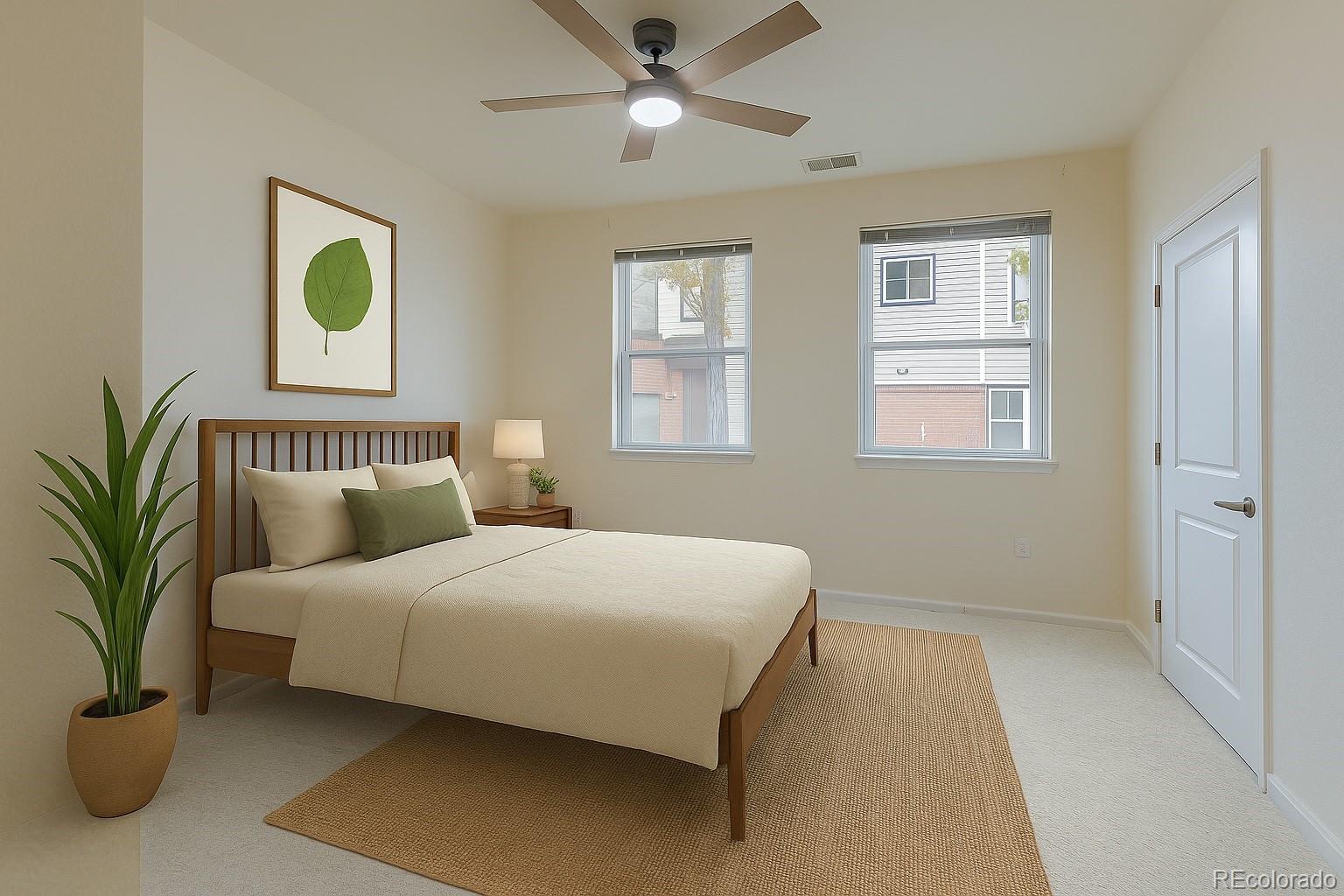 11316 Colony Circle Broomfield, CO 80021 - Photo 9 of 20 a bedroom with a bed and painting on the wall