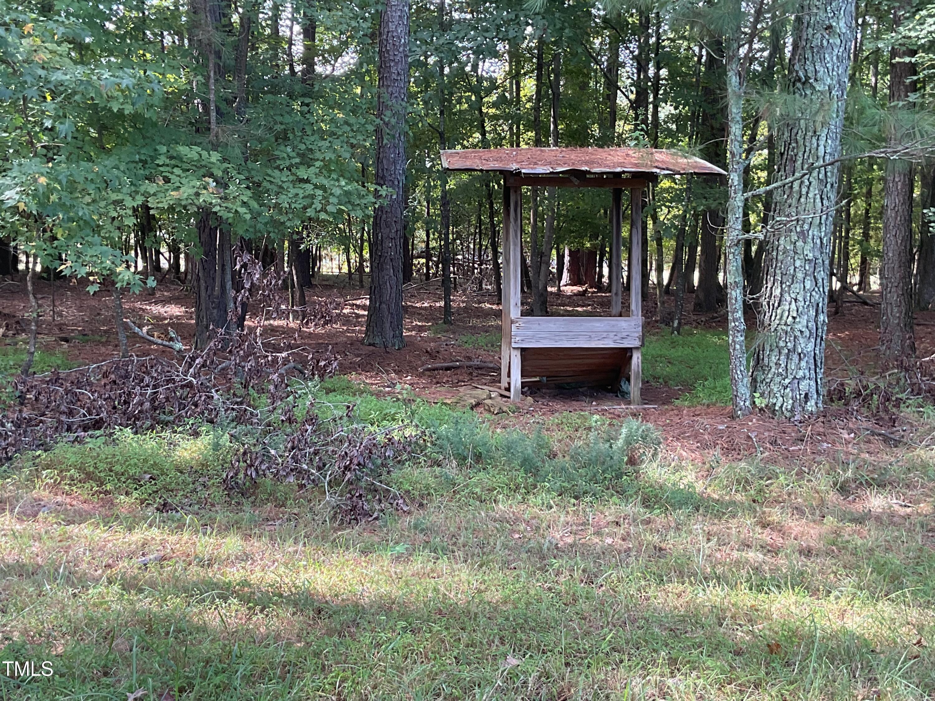 2537 Baptist Road Durham, NC 27703 - Photo 6 of 25 a front view of a house with a garden
