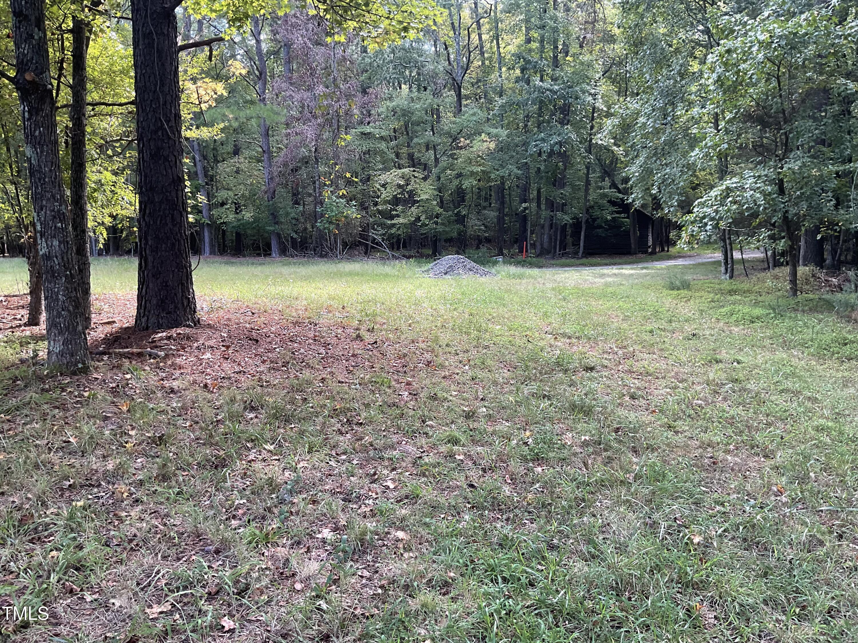2537 Baptist Road Durham, NC 27703 - Photo 7 of 25 a view of outdoor space with a garden