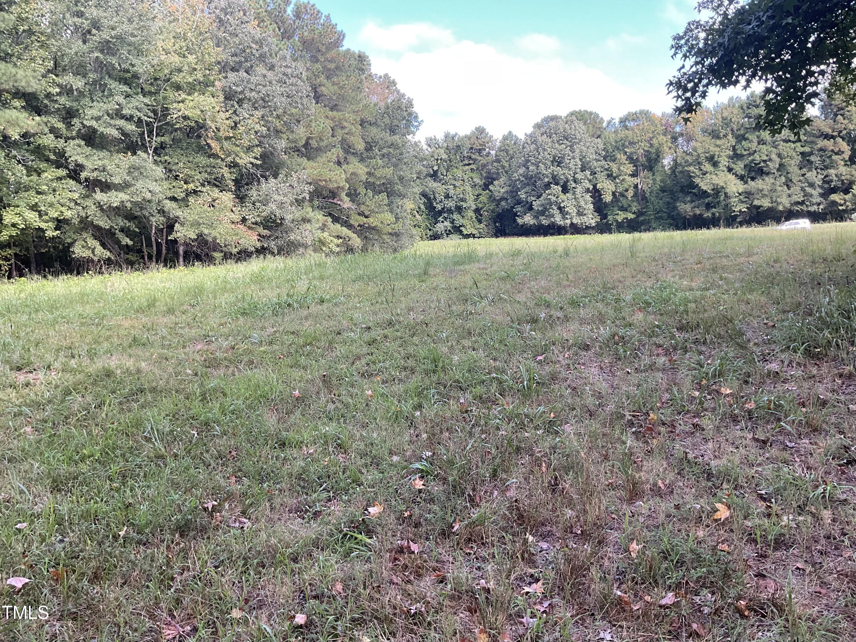 2537 Baptist Road Durham, NC 27703 - Photo 9 of 25 a view of an outdoor space with a lake view
