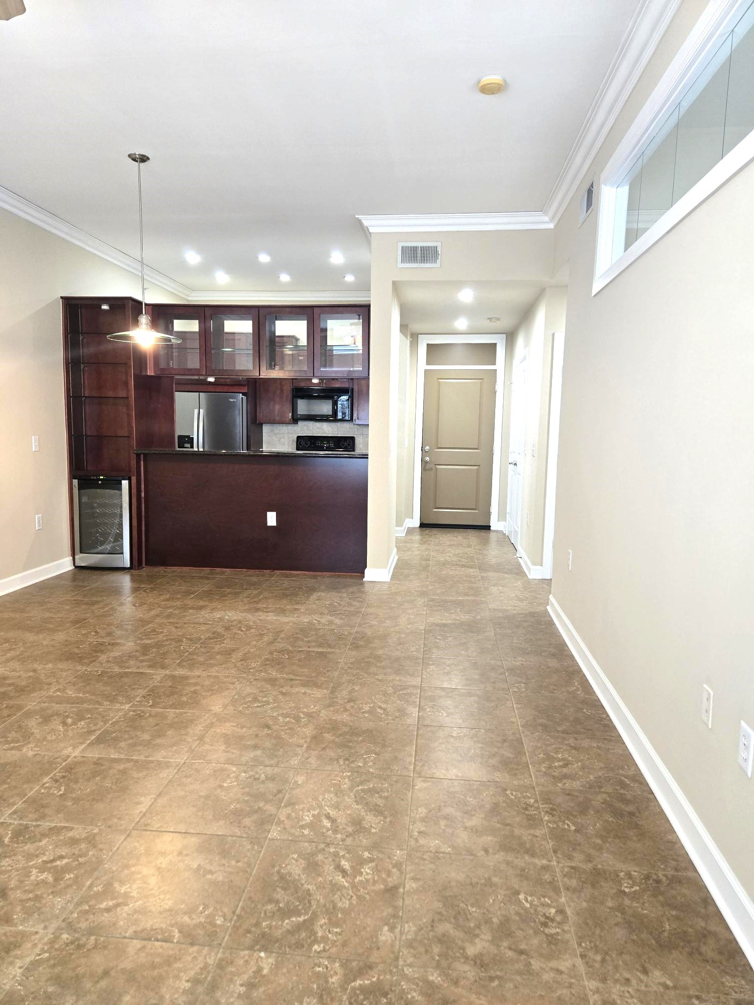 1900 Genesee Street, Unit 207 Houston, TX 77006 - Photo 18 of 50 Notice the pretty crown molding in kitchen, lving room and dining room.