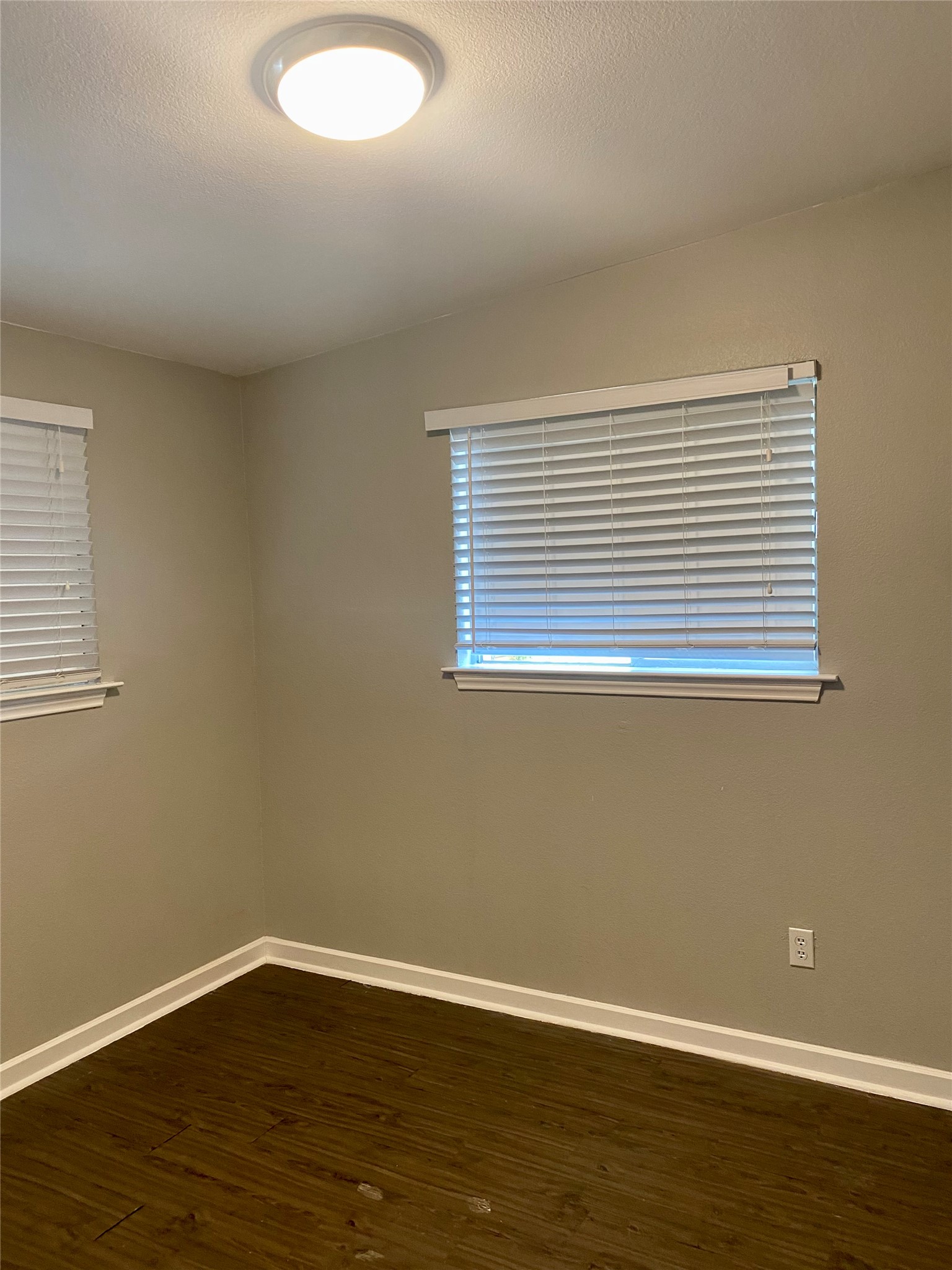 400 Swanee Drive, Unit A Austin, TX 78752 - Photo 6 of 8 a view of a small space with wooden floor and a window