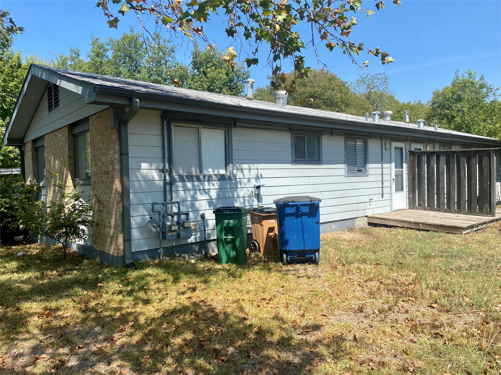 400 Swanee Drive, Unit A Austin, TX 78752 - Photo 7 of 8 a view of a house with backyard and sitting area