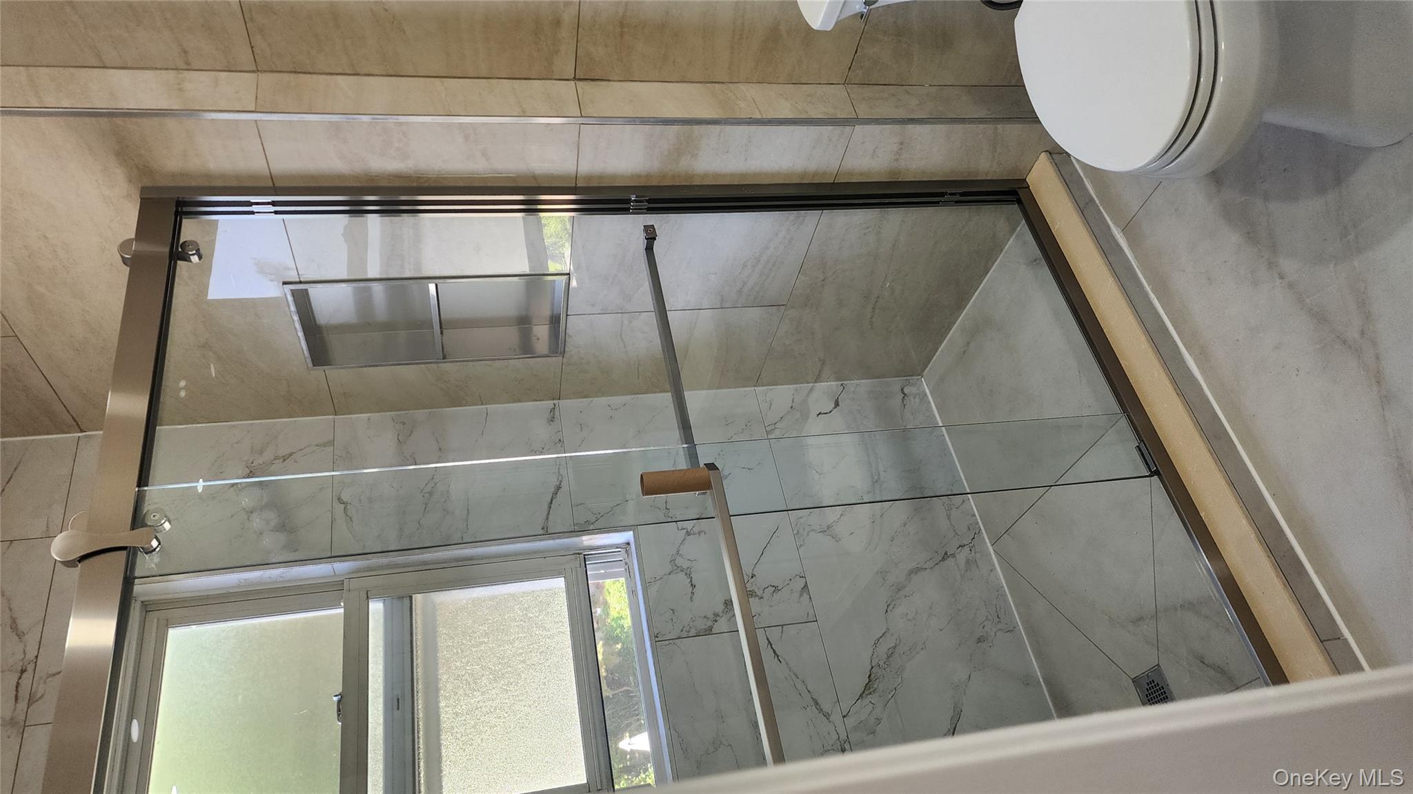 38 Moulton Avenue, Unit 2 Dobbs Ferry, NY 10522 - Photo 15 of 27 a bathroom with a shower and toilet