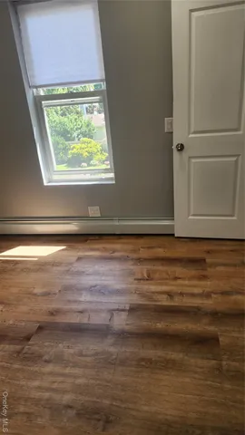 a view of a street with an outdoor space