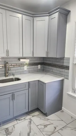 a view of a kitchen with sink
