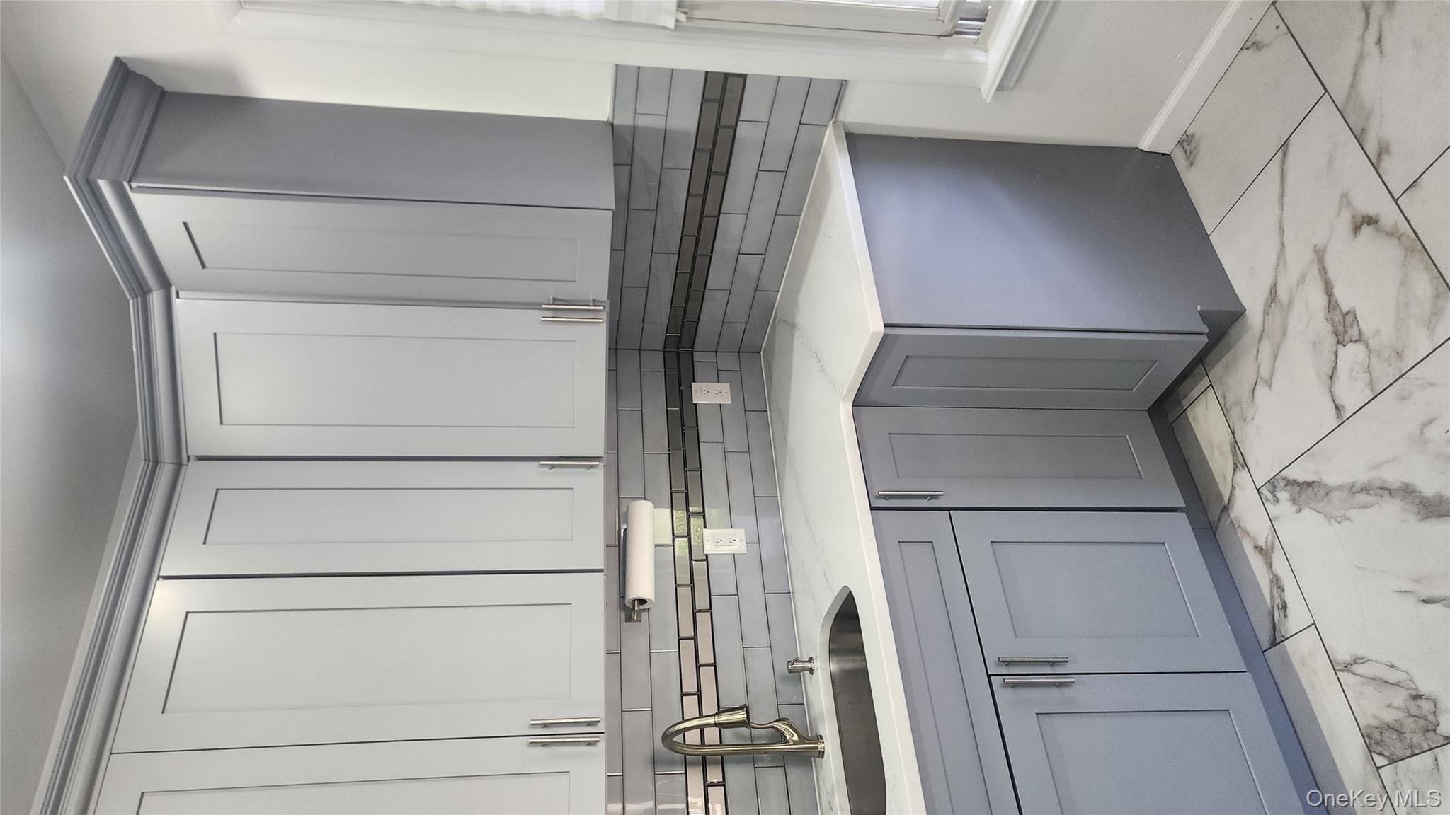 38 Moulton Avenue, Unit 2 Dobbs Ferry, NY 10522 - Photo 2 of 27 a view of a kitchen with sink