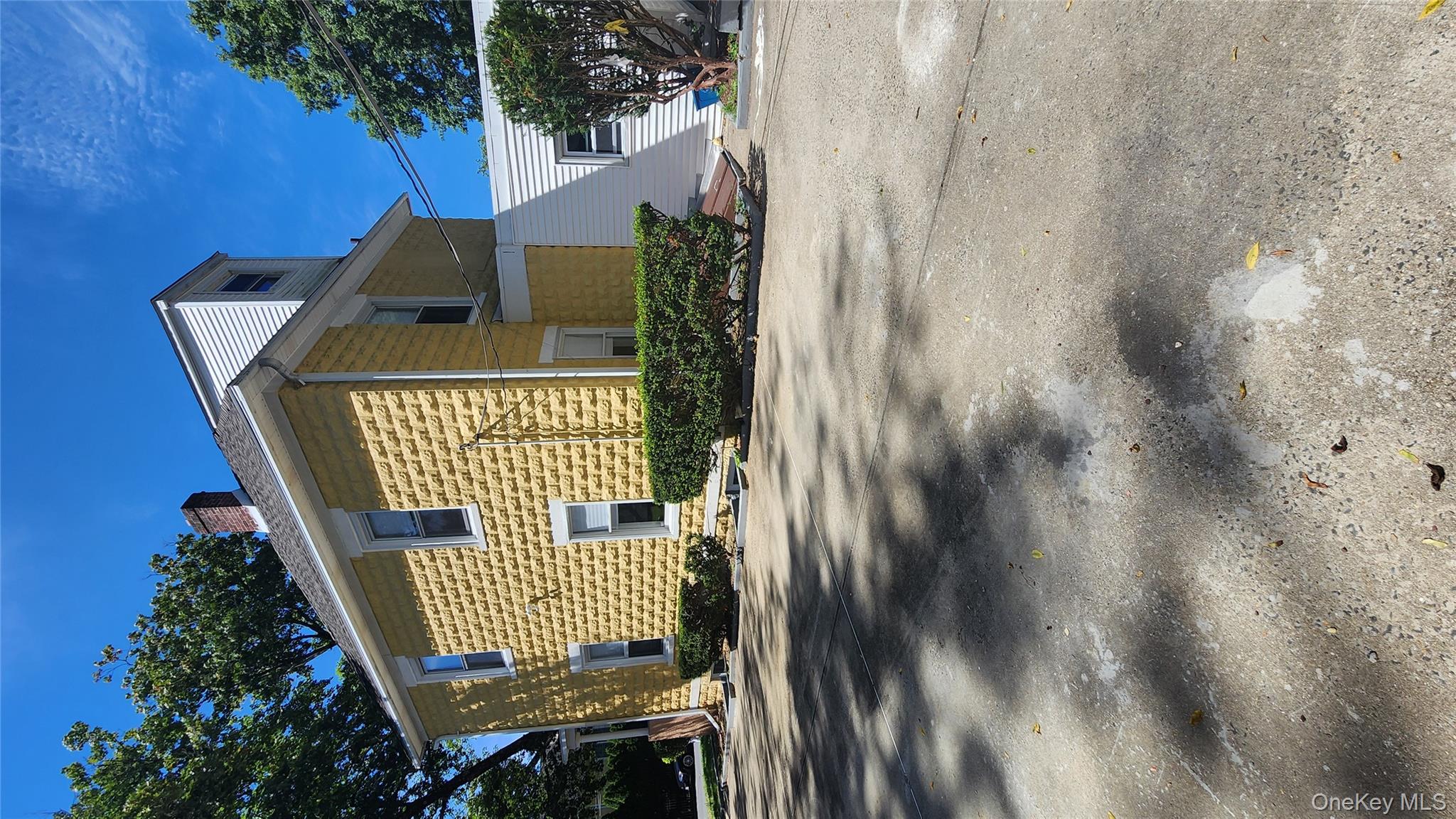 38 Moulton Avenue, Unit 2 Dobbs Ferry, NY 10522 - Photo 25 of 27 a front view of a house with a yard