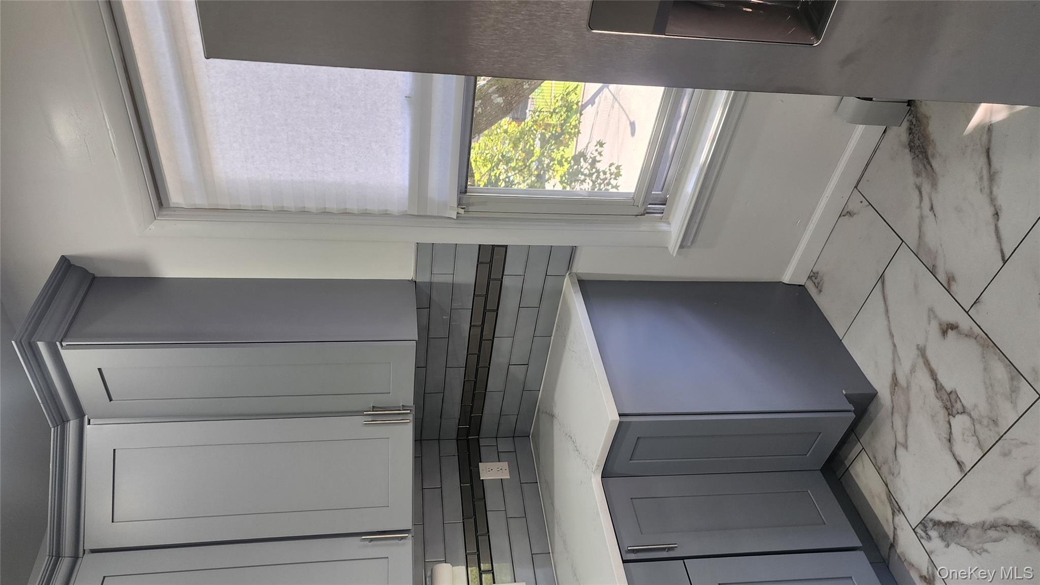 38 Moulton Avenue, Unit 2 Dobbs Ferry, NY 10522 - Photo 4 of 27 a view of kitchen with a sink and a window