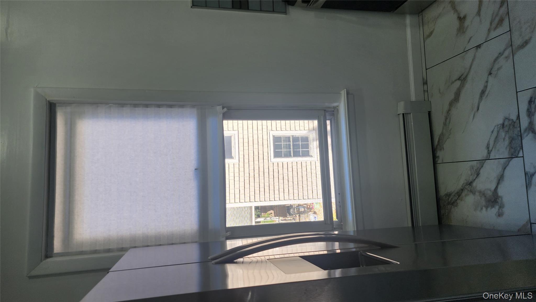 38 Moulton Avenue, Unit 2 Dobbs Ferry, NY 10522 - Photo 6 of 27 a room with a window