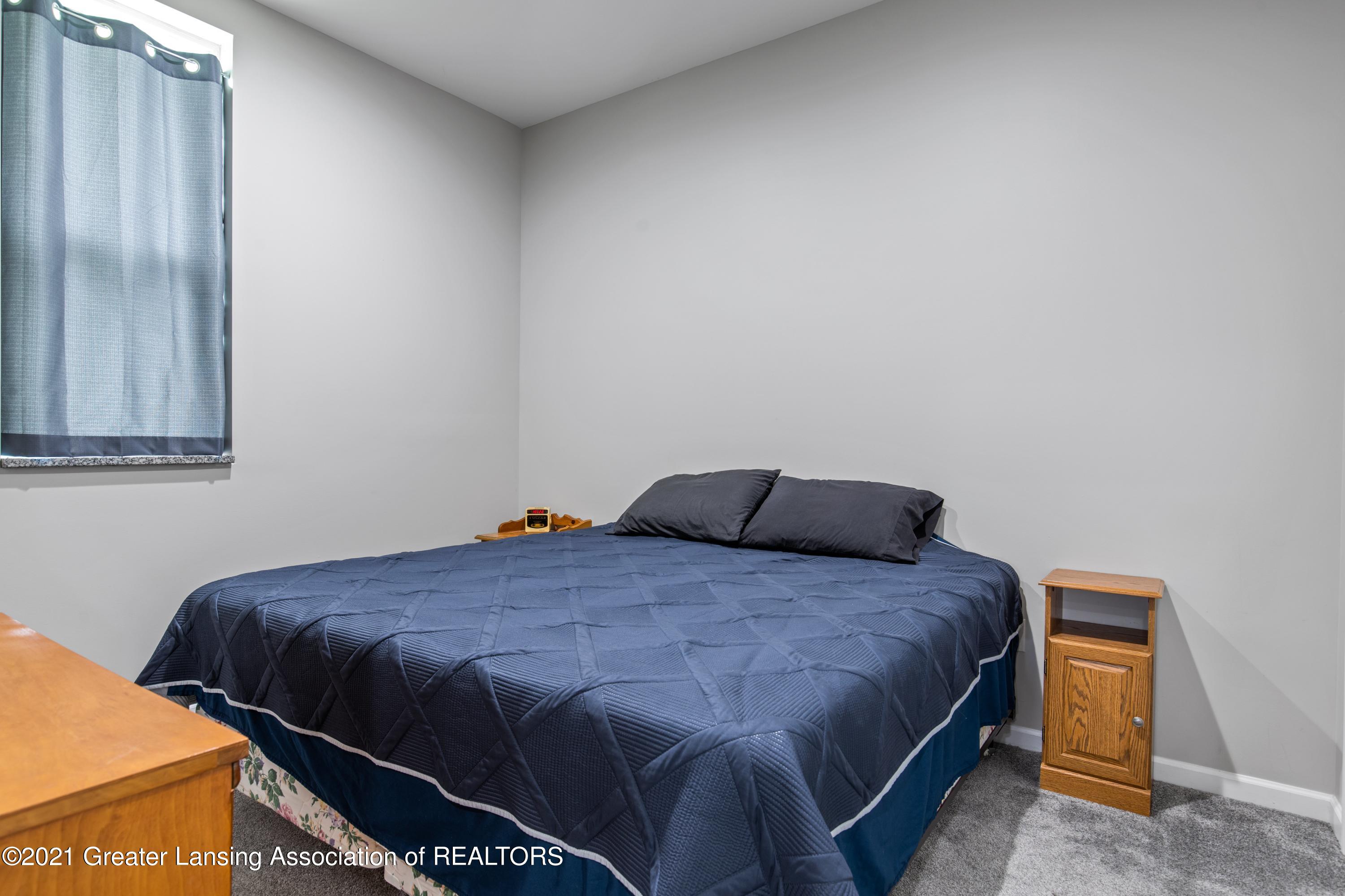 9009 West Sargent Road Fowlerville, MI 48836 - Photo 8 of 19 Primary Bedroom