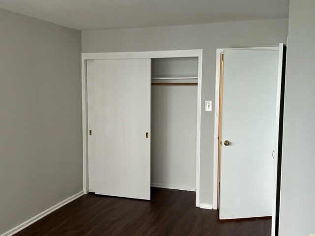 6030 North Sheridan Road, Unit 1712 Chicago, IL 60660 - Photo 13 of 28 a view of empty room with wooden floor