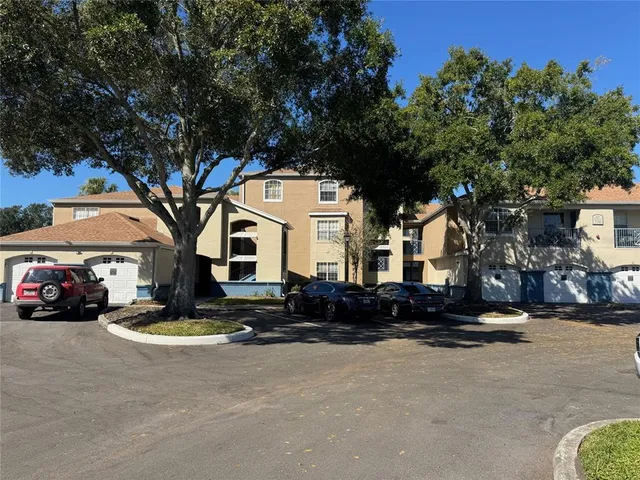 a view of a street with cars