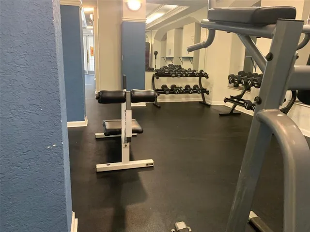 a view of a room with gym equipment