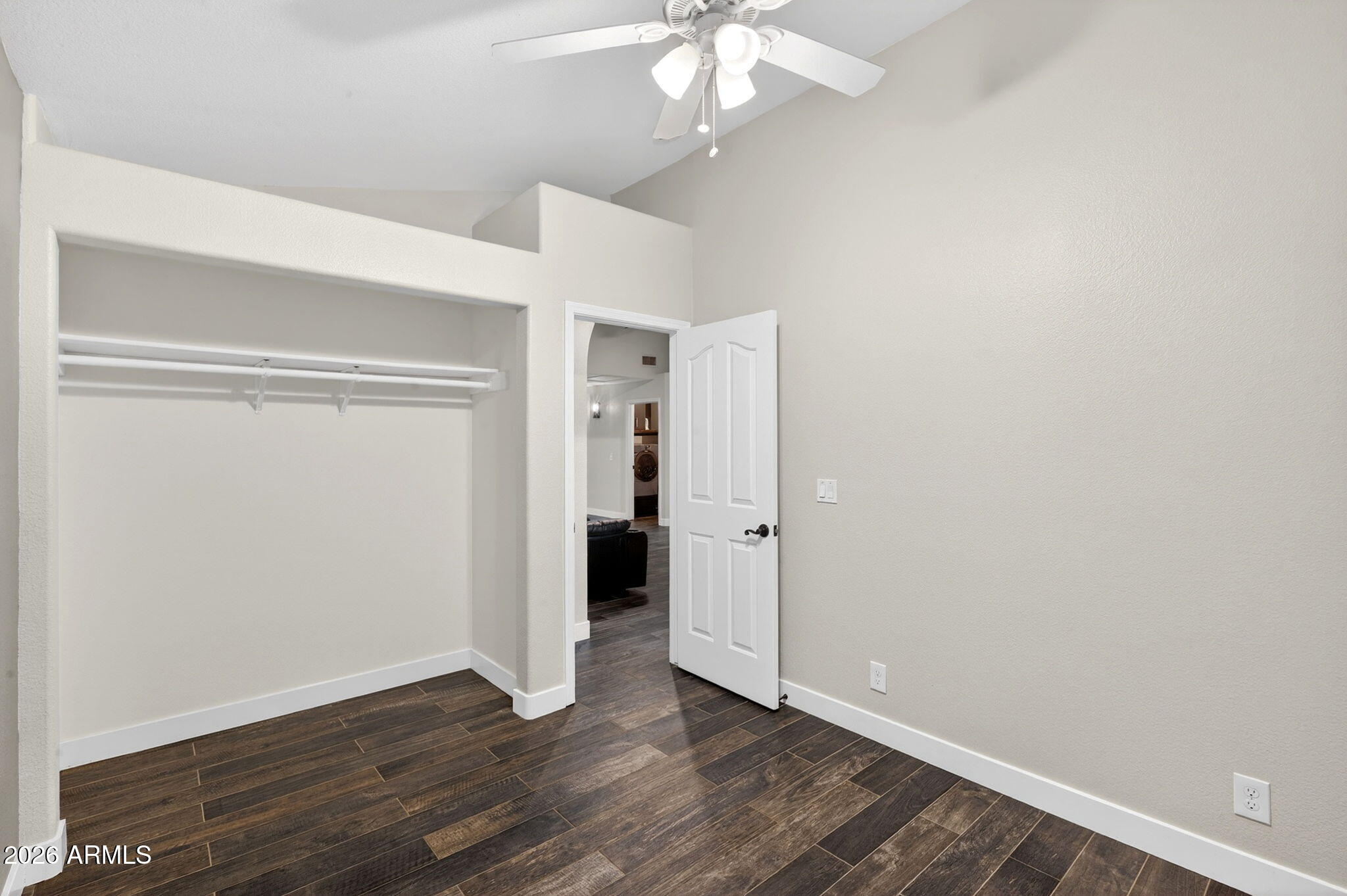 3242 North Ricardo Circle Mesa, AZ 85215 - Photo 42 of 79 a view of an empty room with wooden floor