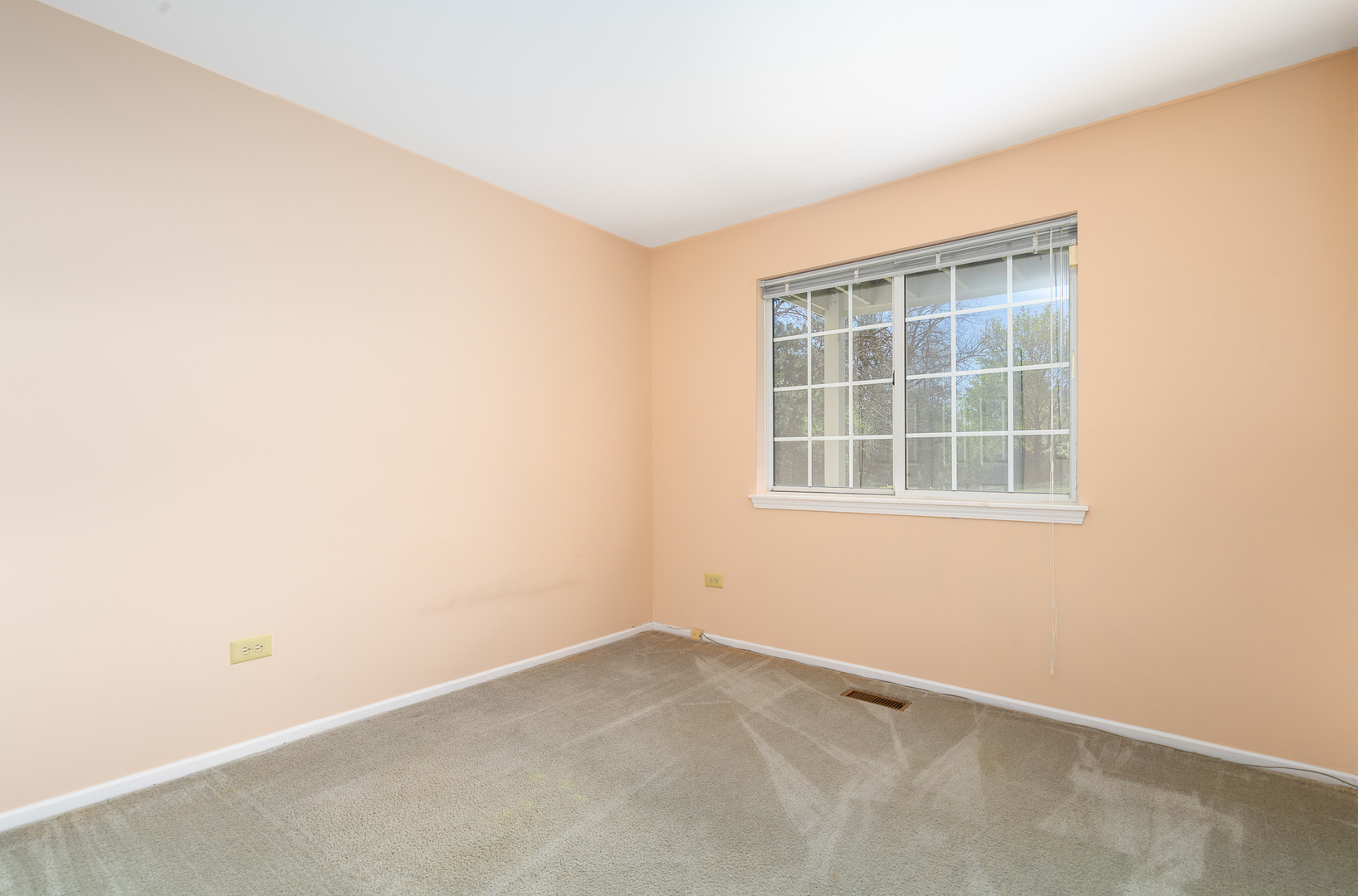 446 Cromwell Circle, Unit 1 Bartlett, IL 60103 - Photo 15 of 28 an empty room with a window