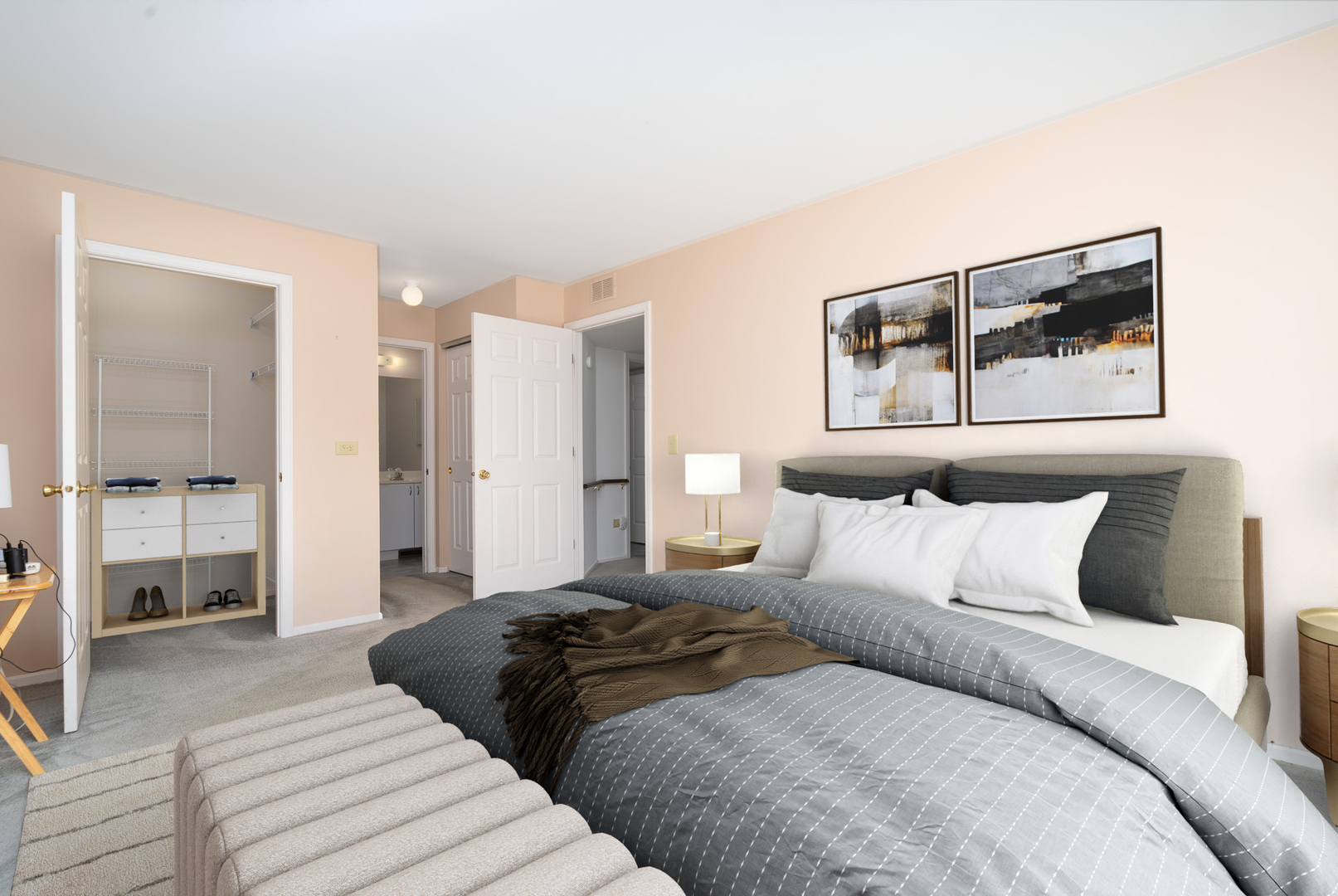 446 Cromwell Circle, Unit 1 Bartlett, IL 60103 - Photo 3 of 28 a bedroom with a bed and a large mirror