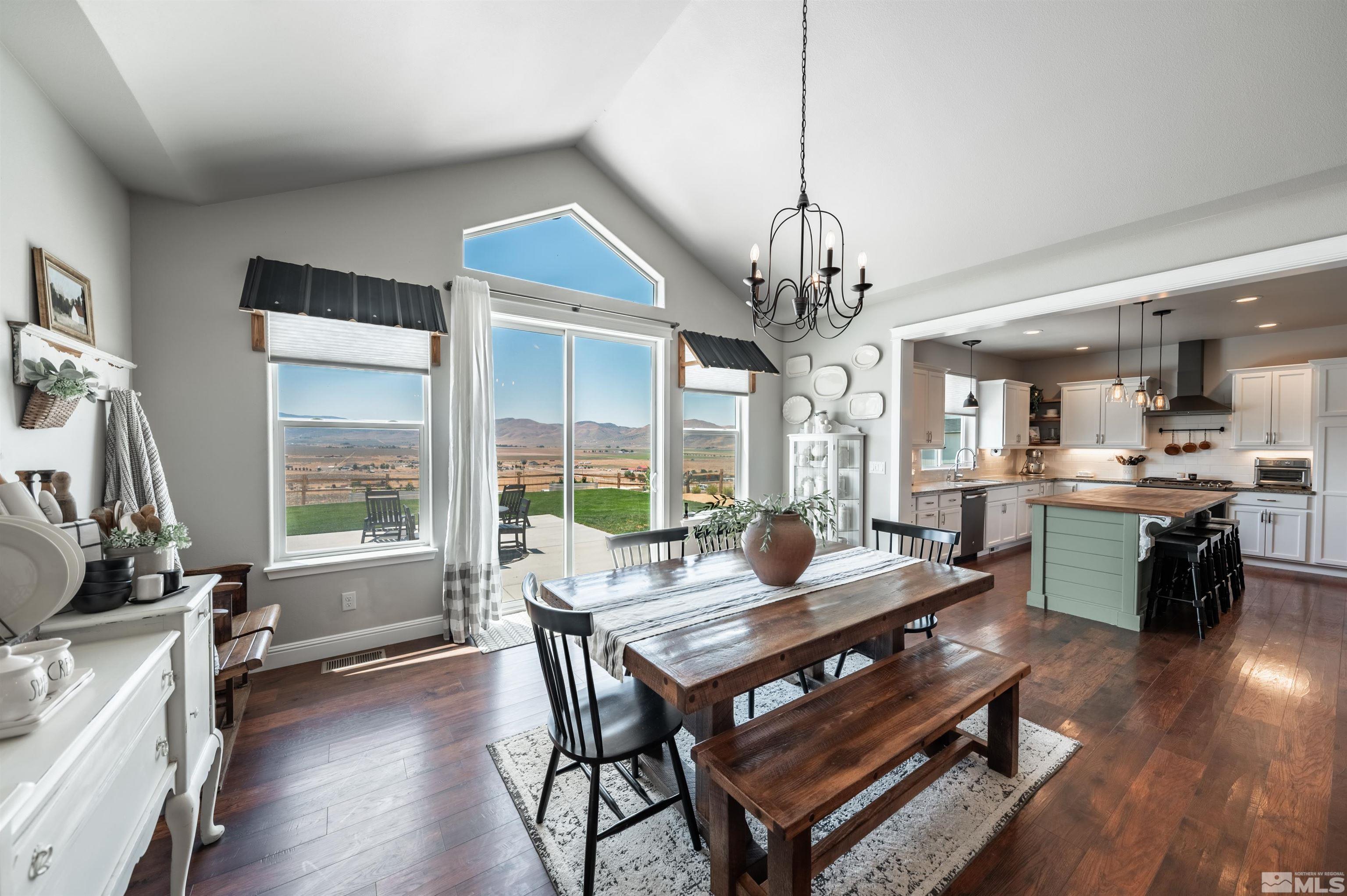 205 Bootstrap Lane Reno, NV 89510 - Photo 13 of 39 a view of a dining room with furniture window and wooden floor