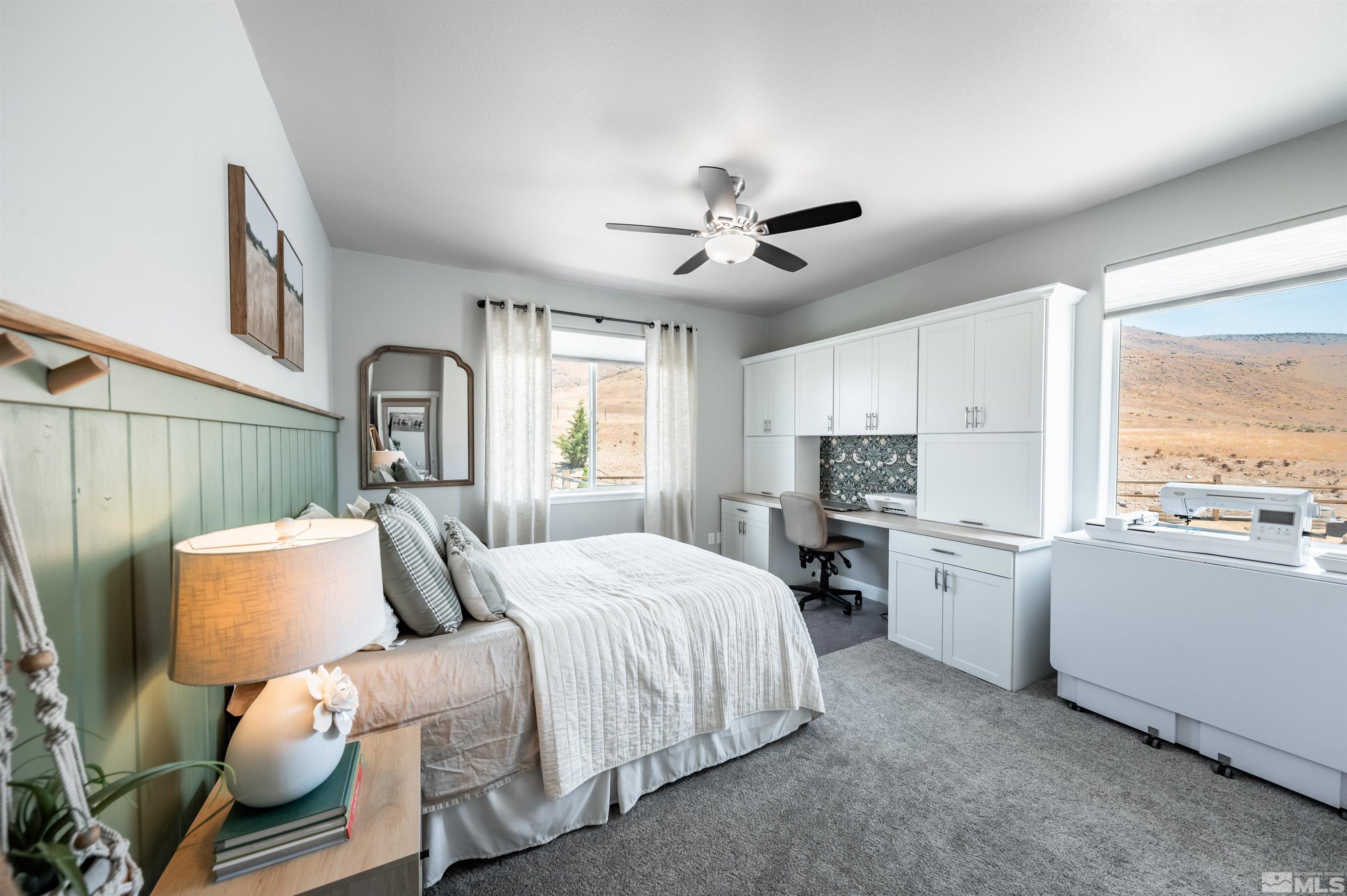 205 Bootstrap Lane Reno, NV 89510 - Photo 18 of 39 a bedroom with furniture and windows