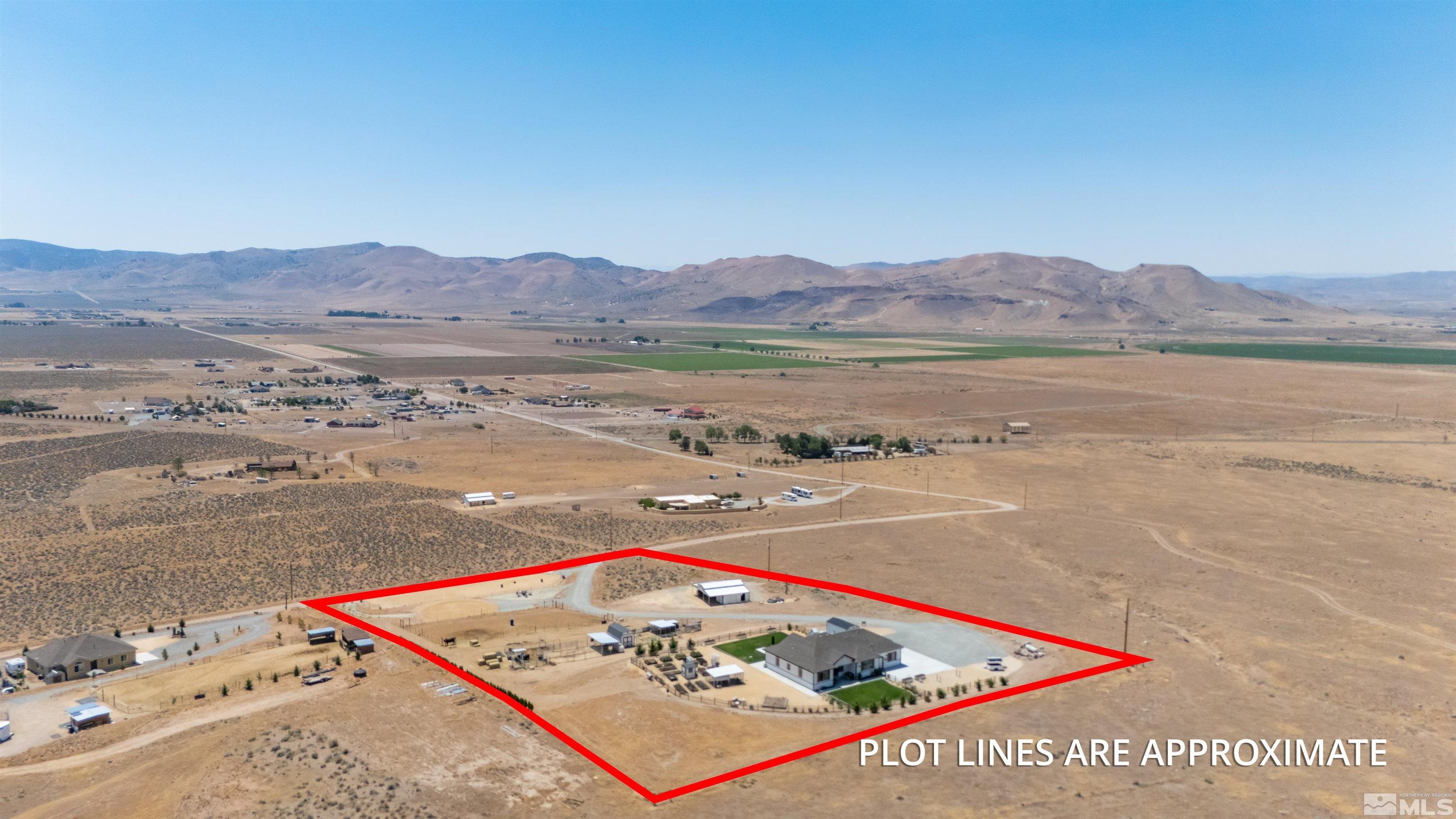 205 Bootstrap Lane Reno, NV 89510 - Photo 2 of 39 a view of a lake with a mountain