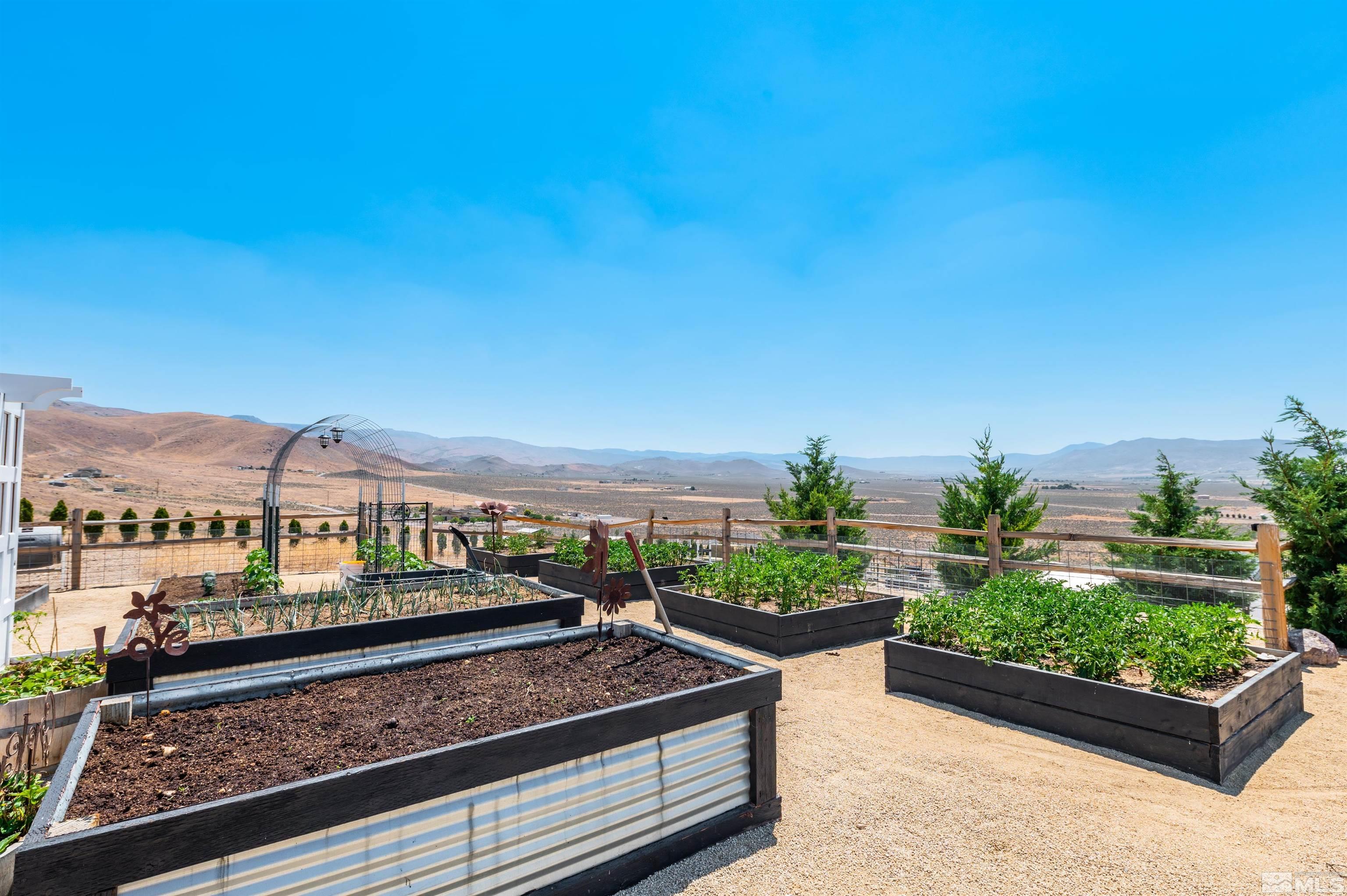 205 Bootstrap Lane Reno, NV 89510 - Photo 25 of 39 a view of a city from a balcony with seating space