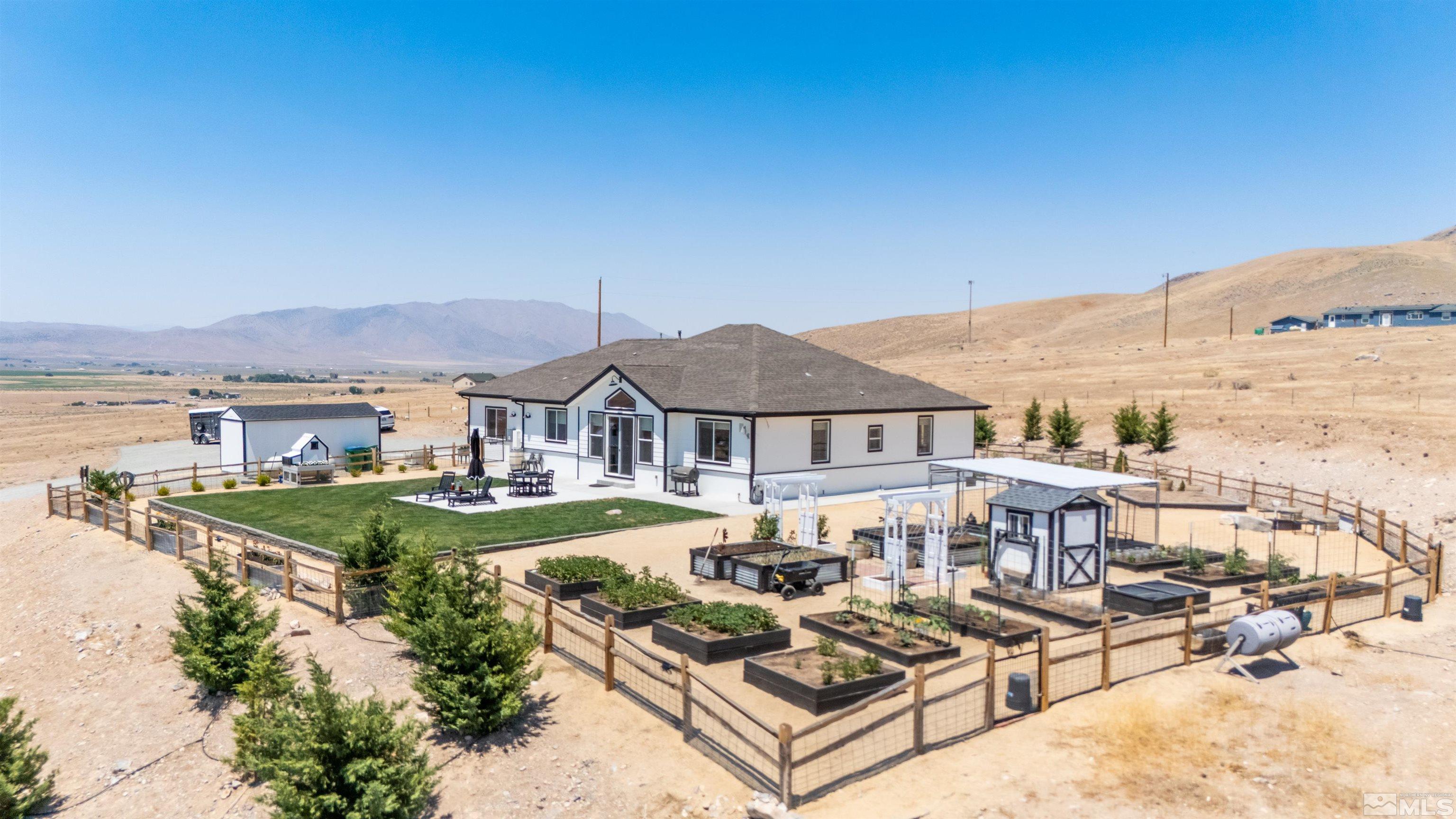205 Bootstrap Lane Reno, NV 89510 - Photo 34 of 39 an aerial view of a house with swimming pool garden and patio