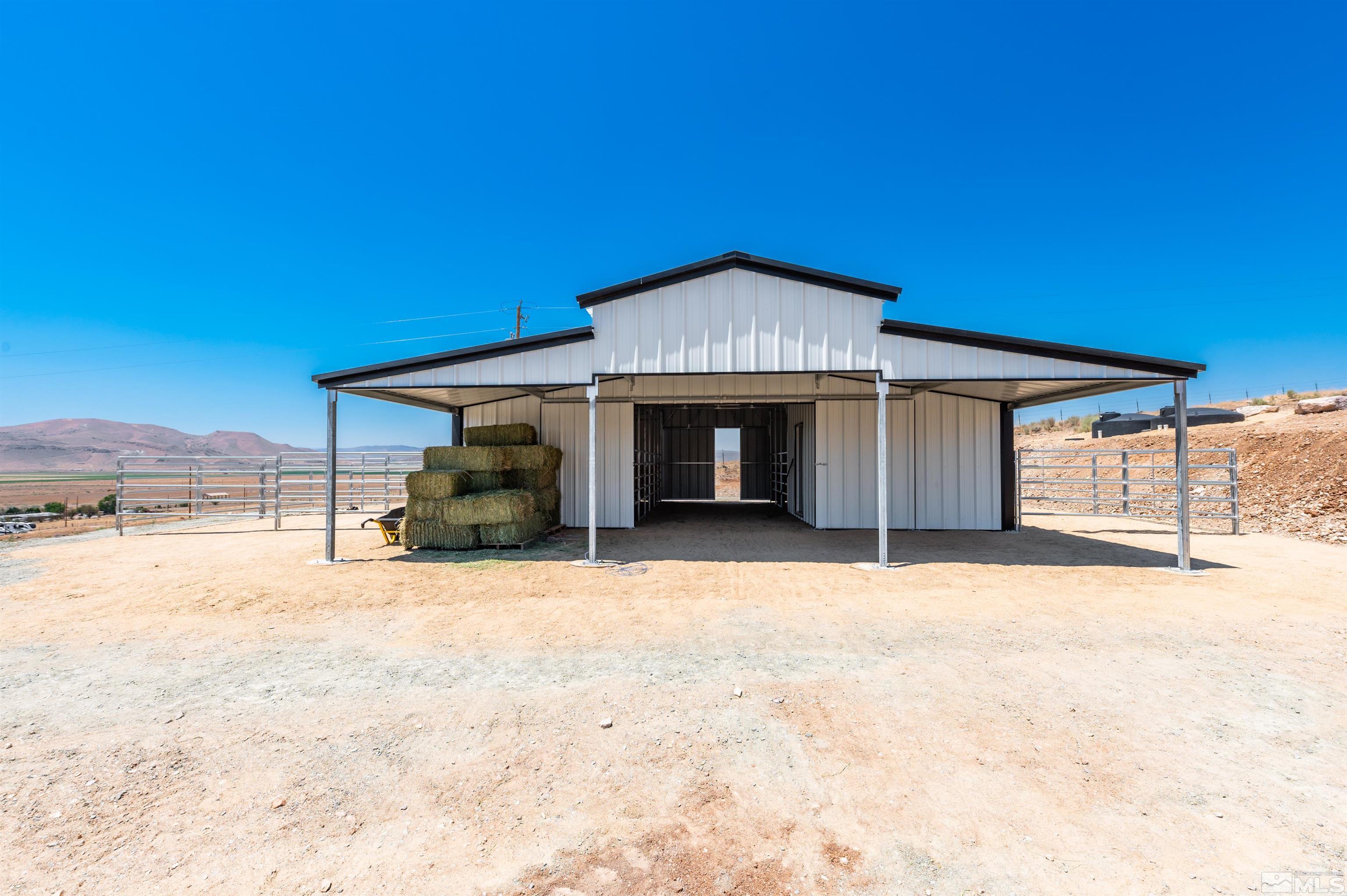 205 Bootstrap Lane Reno, NV 89510 - Photo 5 of 39 a front view of a house with a yard