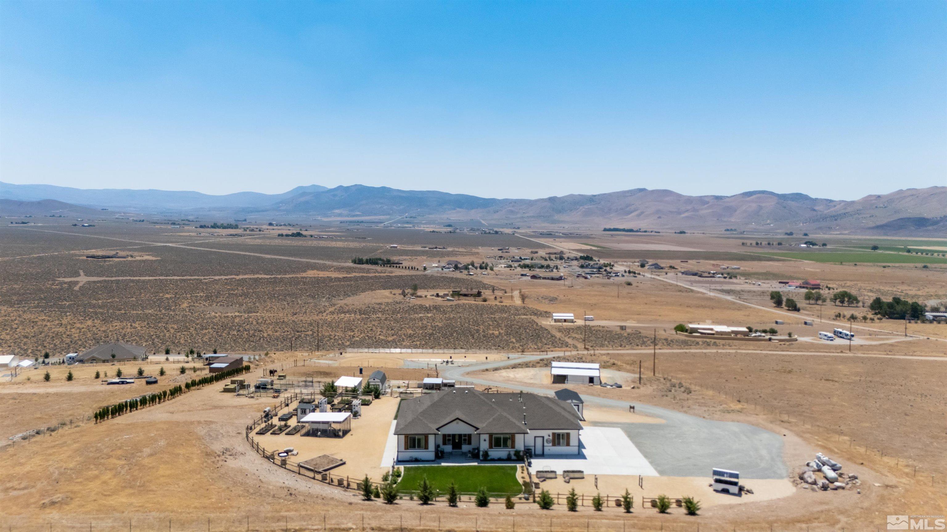 205 Bootstrap Lane Reno, NV 89510 - Photo 6 of 39 a view of a lake with a mountain