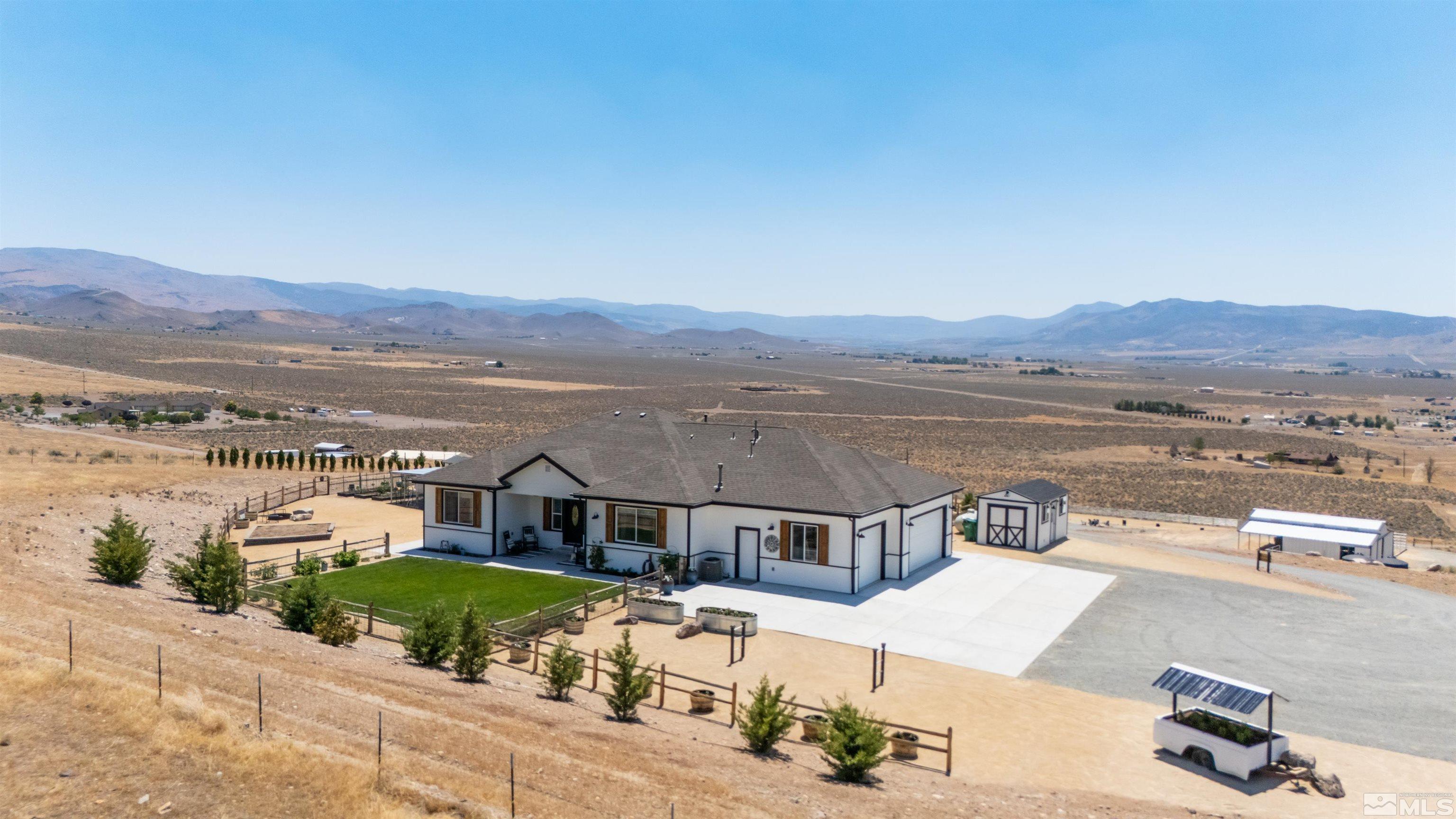 205 Bootstrap Lane Reno, NV 89510 - Photo 7 of 39 an aerial view of a house with a garden