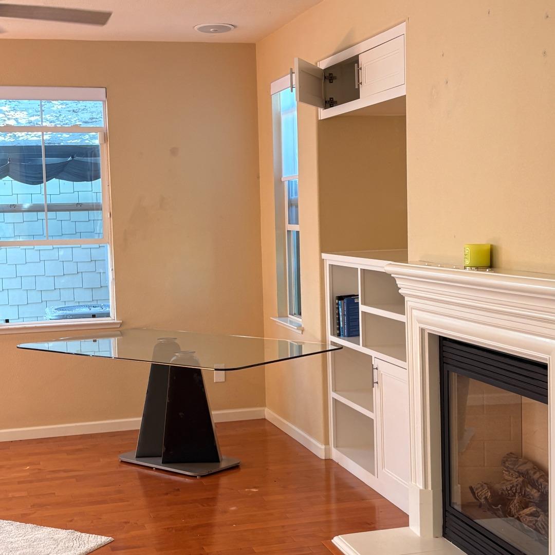 7969 Kipling Circle Gilroy, CA 95020 - Photo 7 of 19 a living room with a fireplace