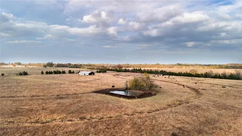 a view of a lake with lots of trees